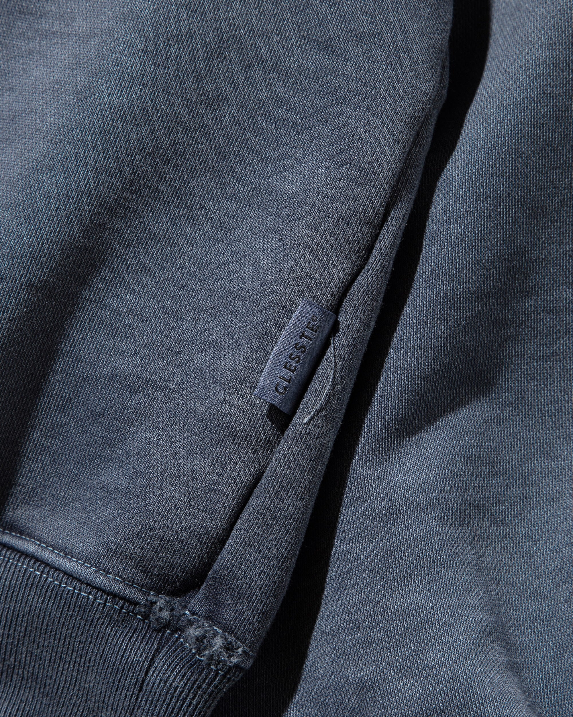 PIGMENT DYED ZIP POLO (FADE BLUE)