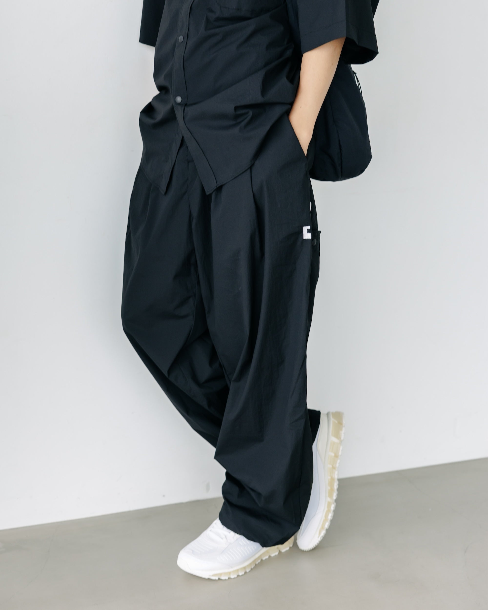 CRISPY NYLON CITY UNIFORM WIDE TAPERED PANTS (BLACK)