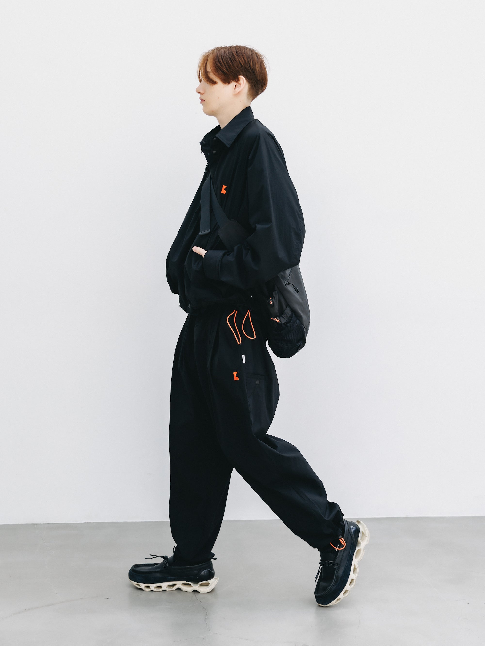"C” CRISPY NYLON CITY UNIFORM WIDE TAPERED PANTS (BLACK×ORANGE)