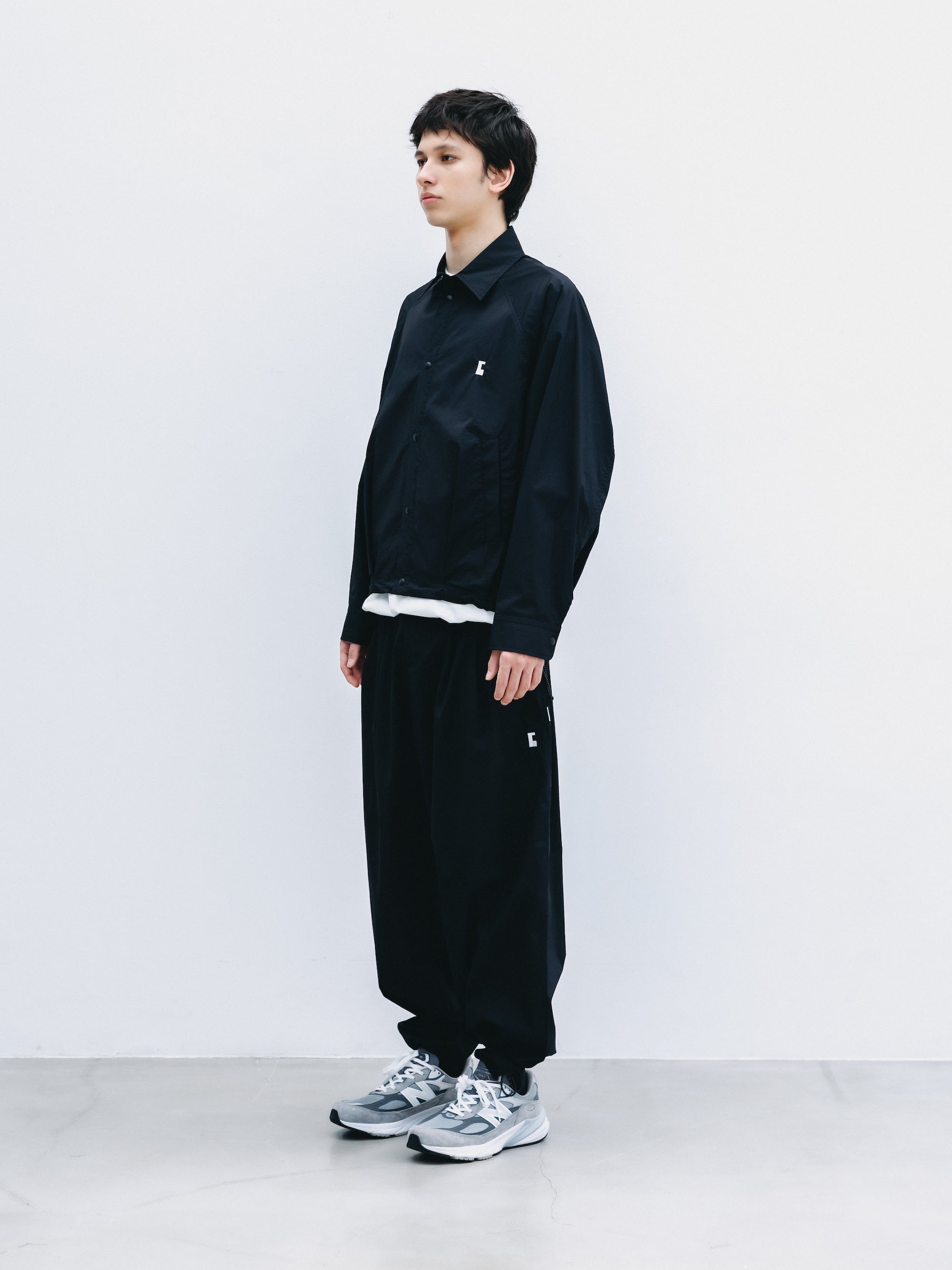 "C” CRISPY NYLON CITY UNIFORM WIDE TAPERED PANTS (BLACK×WHITE)