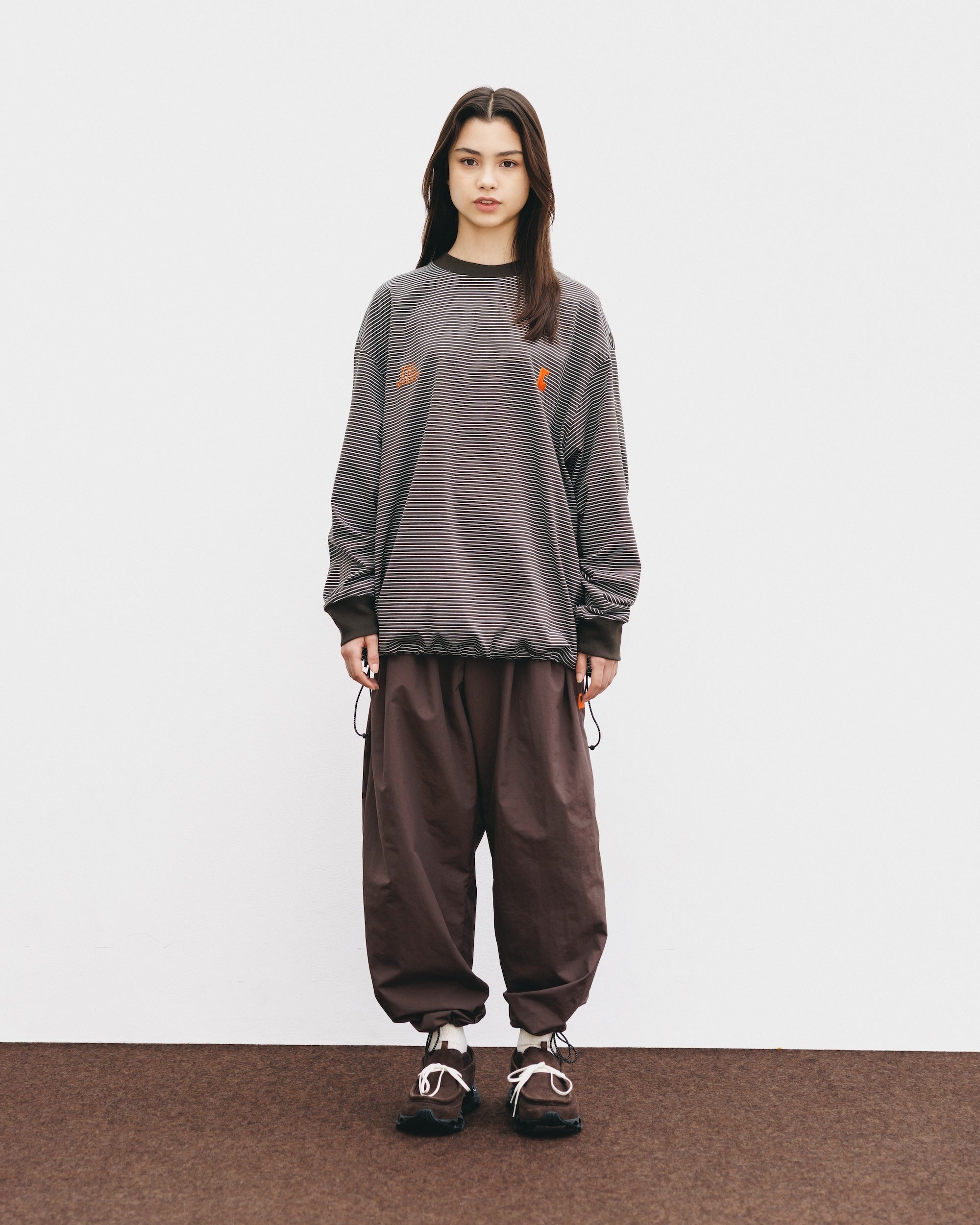 【10.15 WED 20:00- IN STOCK】WATER REPELLENT NYLON CITY UNIFORM WIDE TAPERED PANTS FOR YGM (BROWN×ORANGE)