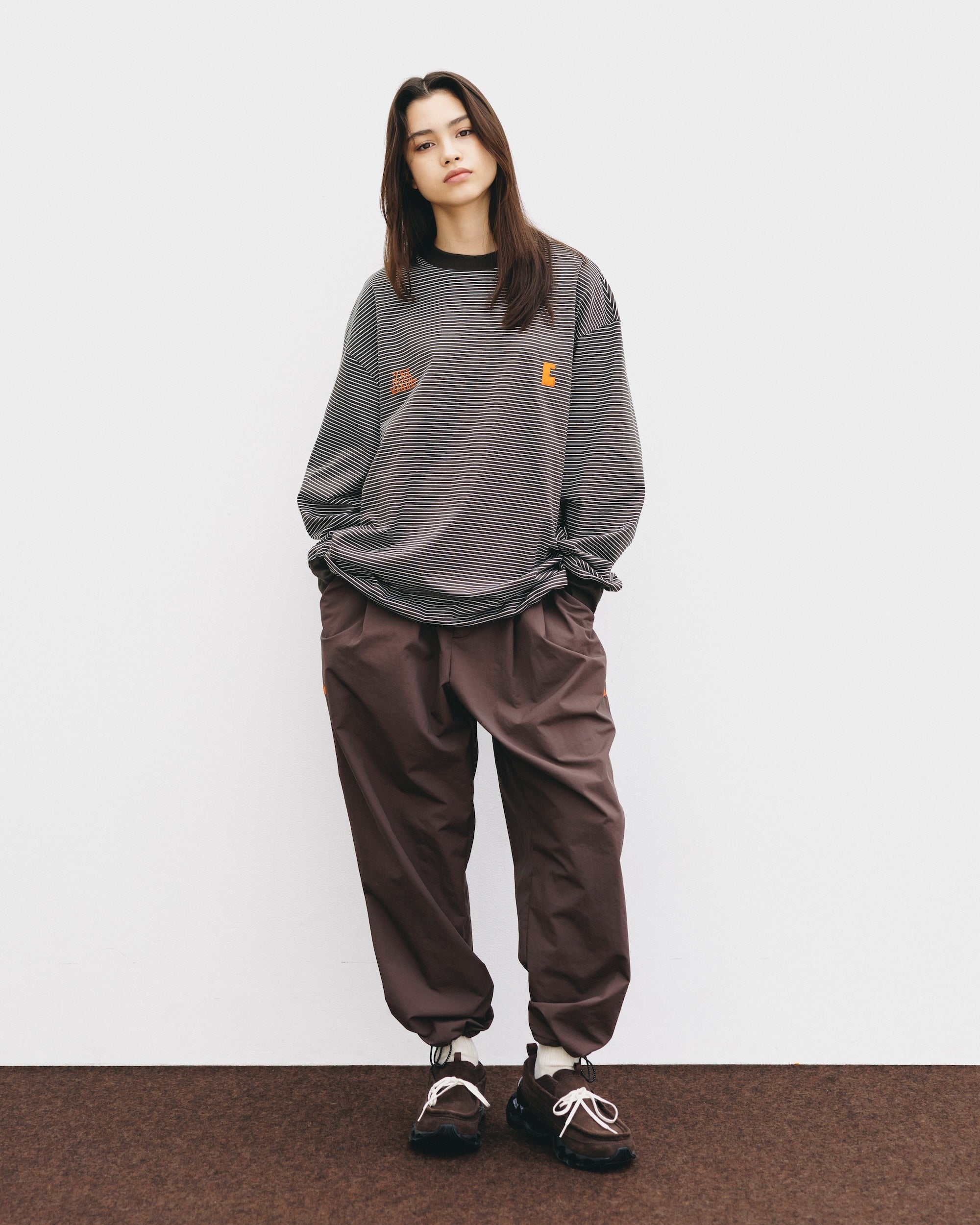 【10.15 WED 20:00- IN STOCK】WATER REPELLENT NYLON CITY UNIFORM WIDE TAPERED PANTS FOR YGM (BROWN×ORANGE)