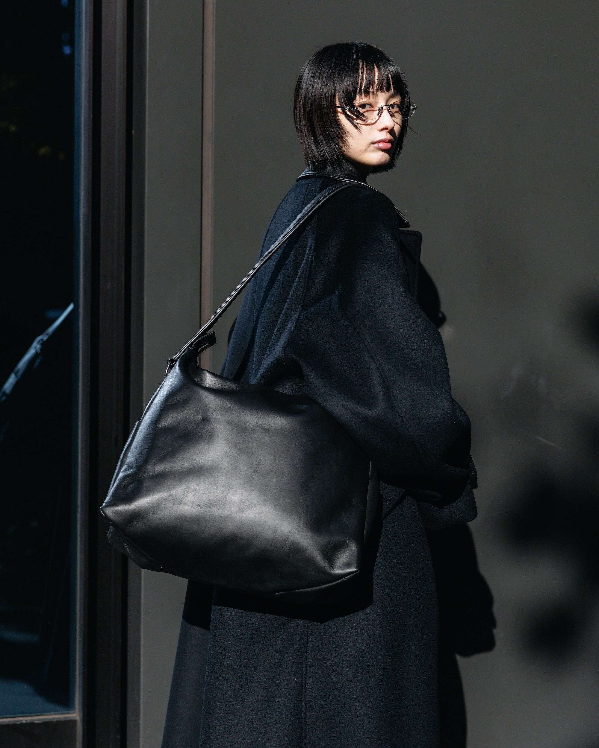 LEATHER NOMAD BAG