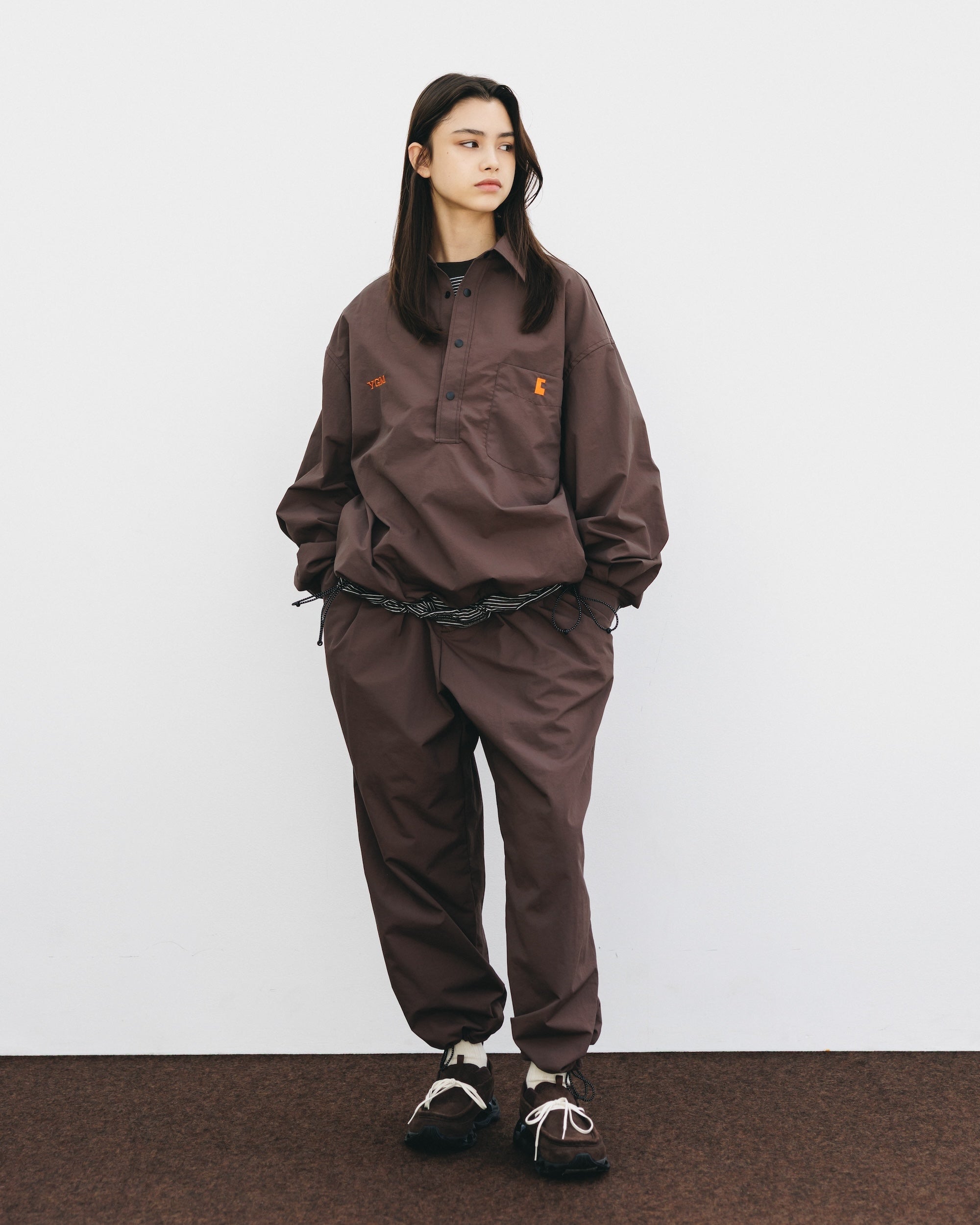 【10.15 WED 20:00- IN STOCK】WATER REPELLENT NYLON CITY UNIFORM WIDE TAPERED PANTS FOR YGM (BROWN×ORANGE)