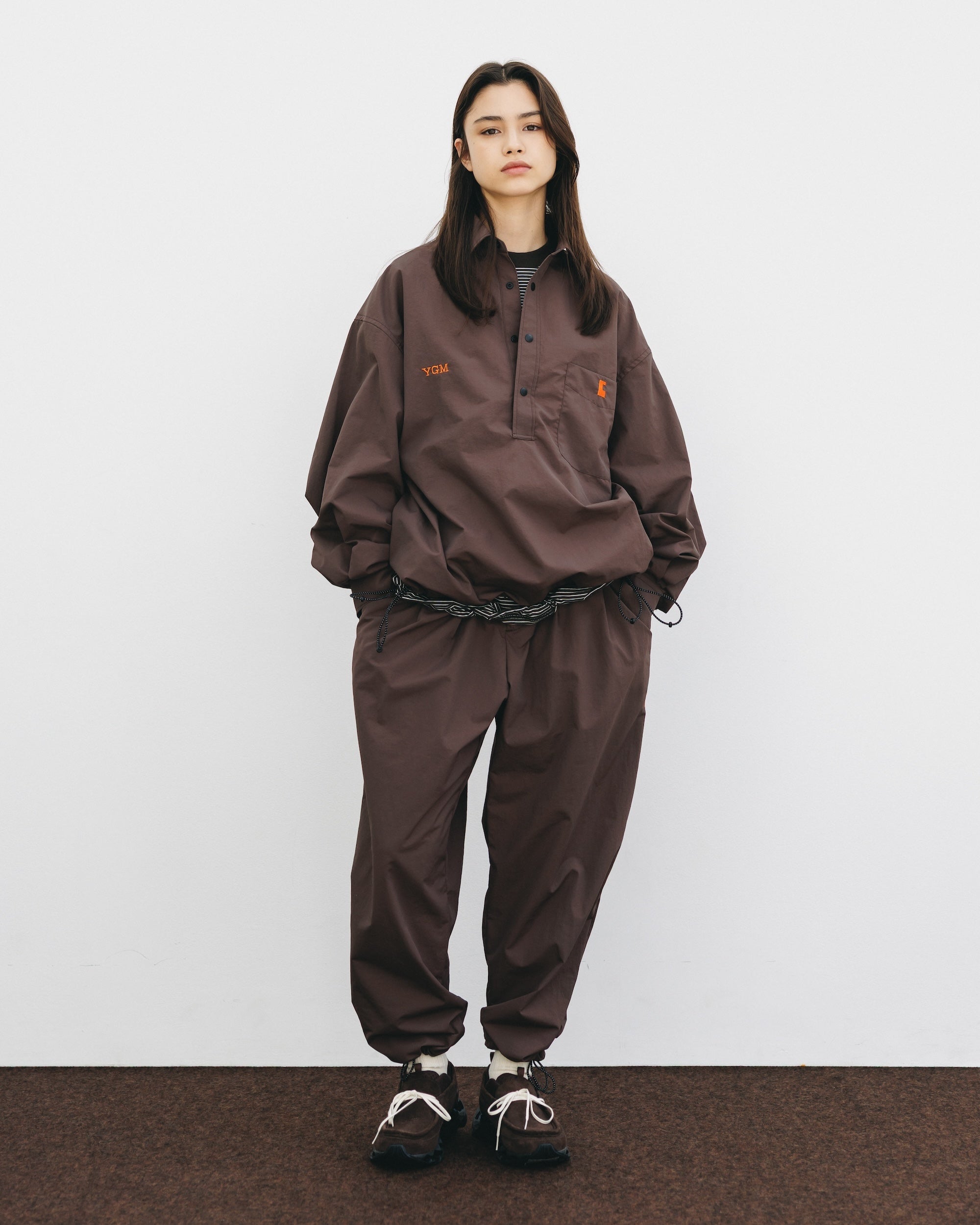 【10.15 WED 20:00- IN STOCK】WATER REPELLENT NYLON CITY UNIFORM WIDE TAPERED PANTS FOR YGM (BROWN×ORANGE)