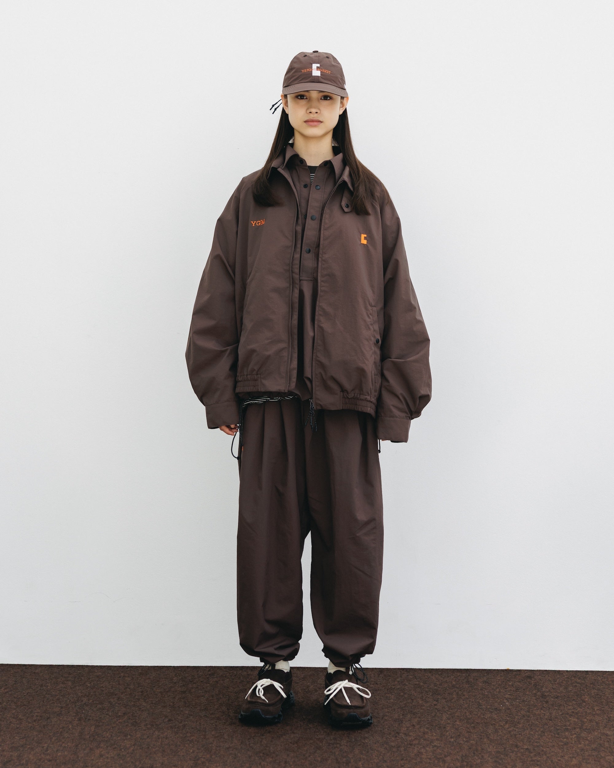 【10.15 WED 20:00- IN STOCK】WATER REPELLENT NYLON CITY UNIFORM WIDE TAPERED PANTS FOR YGM (BROWN×ORANGE)