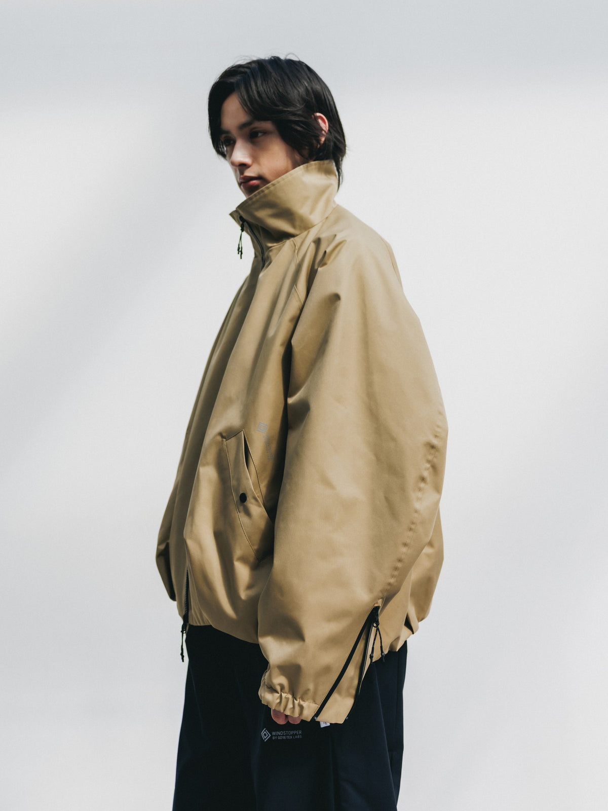 【10.17 SAT 20:00- IN STOCK】 +phenix WINDSTOPPER® by GORE-TEX LABS TWILL CITY STAND BALLOON UTILITY JACKET (CAMEL BEIGE)