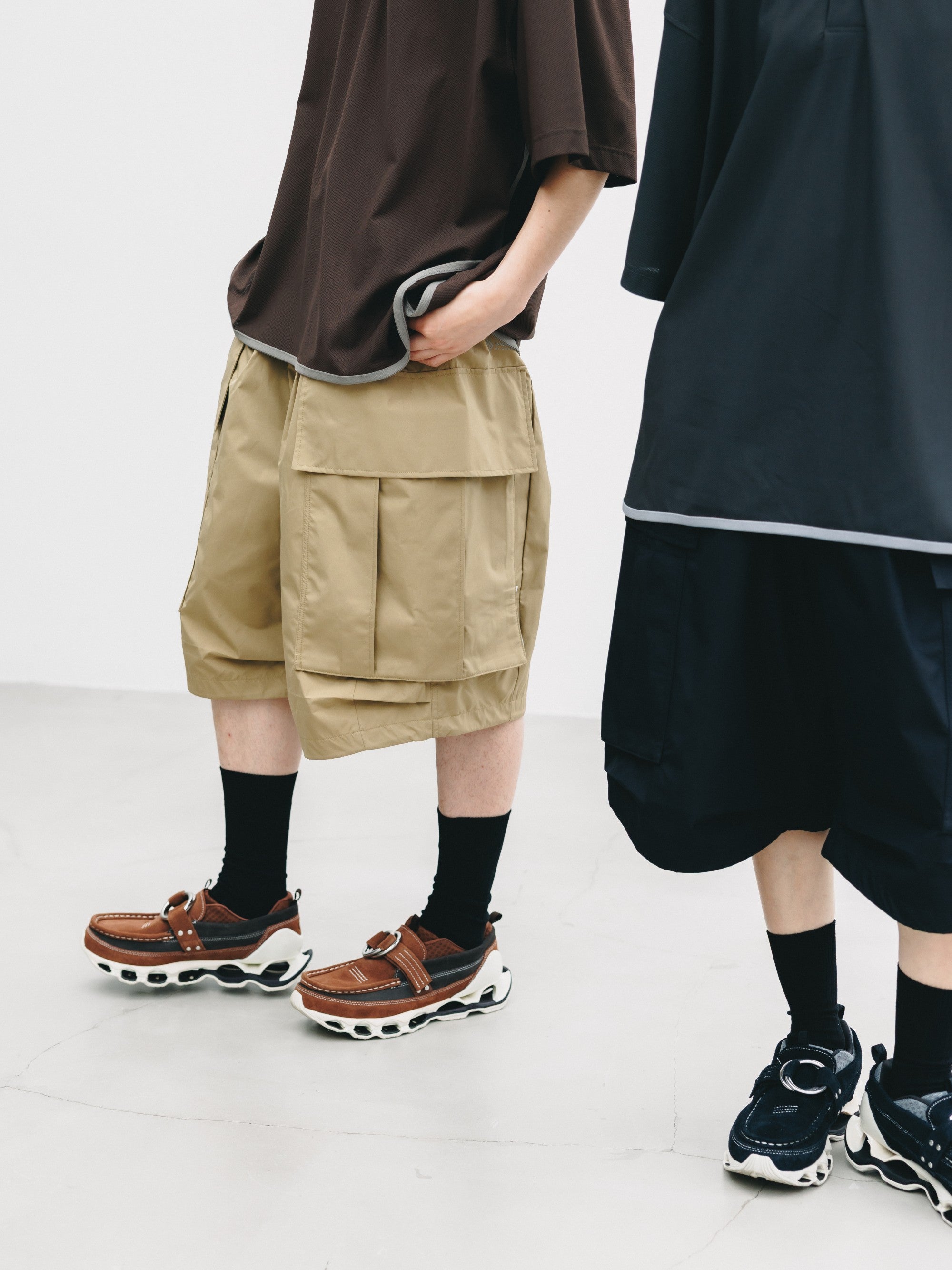 【7.18 SAT 20:00- IN STOCK】+PHENIX WINDSTOPPER® BY GORE-TEX LABS CITY MEGA POCKET BALLOON CARGO HALF PANTS (CAMEL BEIGE)