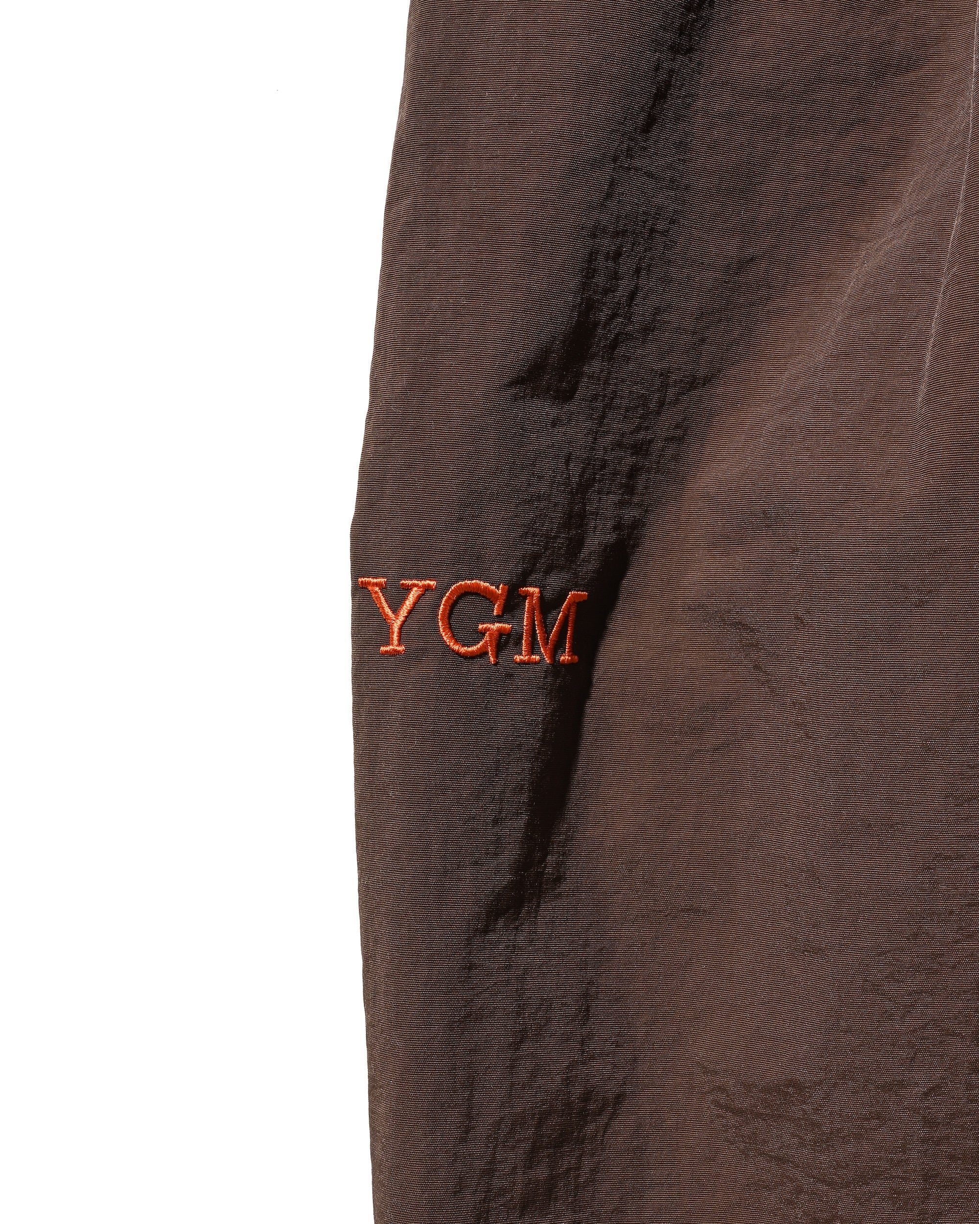 【10.15 WED 20:00- IN STOCK】WATER REPELLENT NYLON CITY UNIFORM WIDE TAPERED PANTS FOR YGM (BROWN×ORANGE)