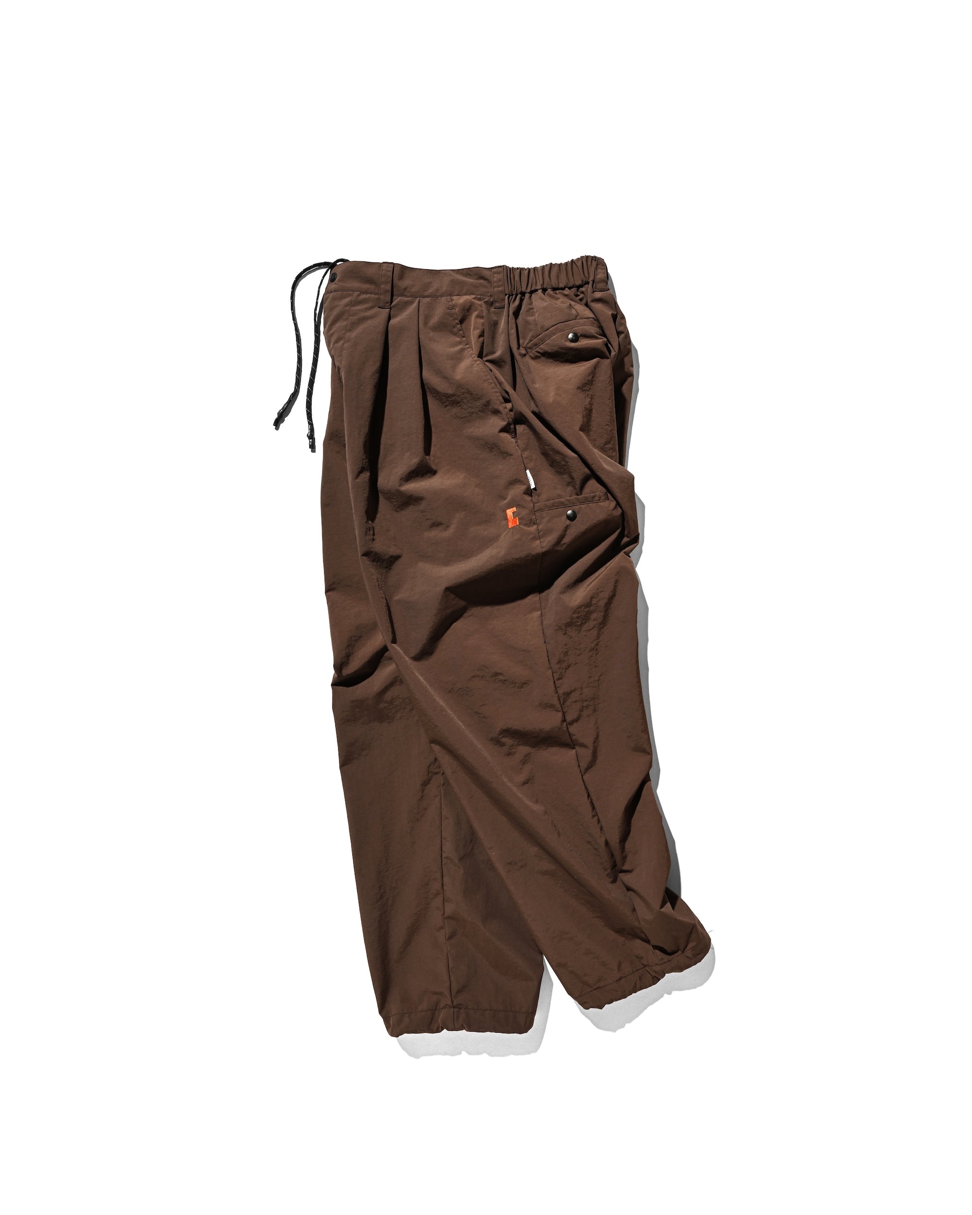 【10.15 WED 20:00- IN STOCK】WATER REPELLENT NYLON CITY UNIFORM WIDE TAPERED PANTS FOR YGM (BROWN×ORANGE)