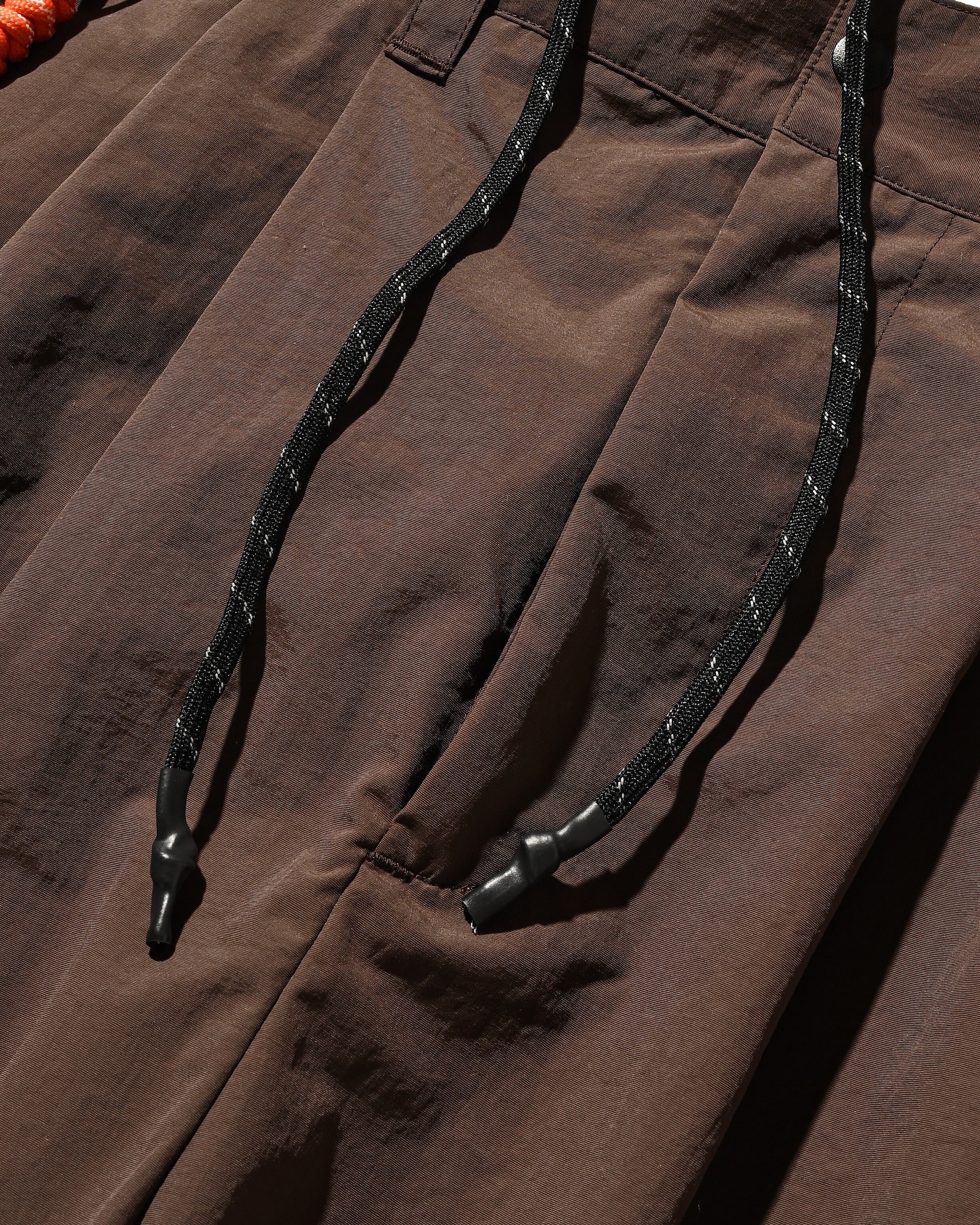 【10.15 WED 20:00- IN STOCK】WATER REPELLENT NYLON CITY UNIFORM WIDE TAPERED PANTS FOR YGM (BROWN×ORANGE)