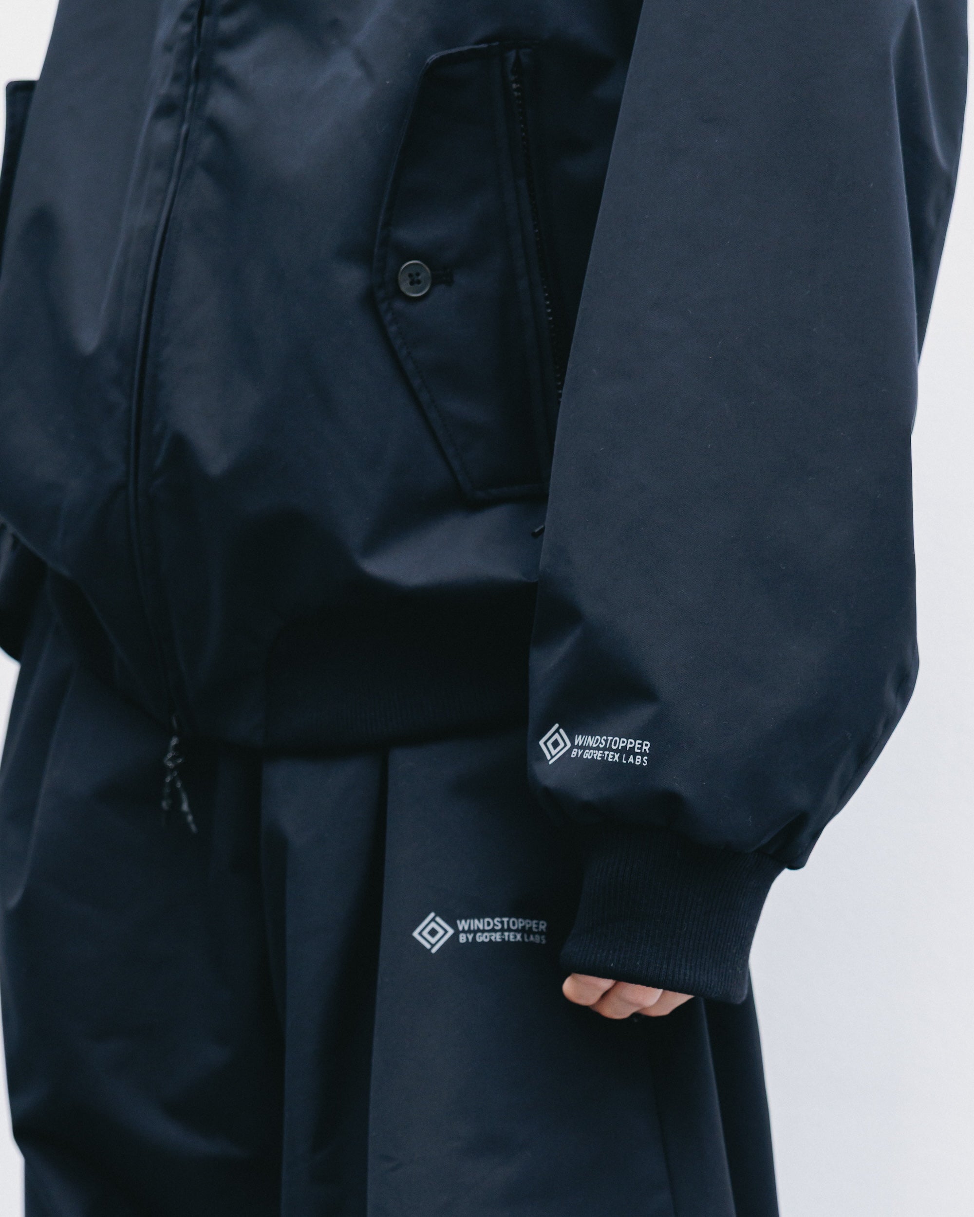【10.29 WED 20:00- IN STOCK】+phenix WINDSTOPPER® by GORE-TEX LABS TWILL CITY HARRINGTON JACKET (BLACK)