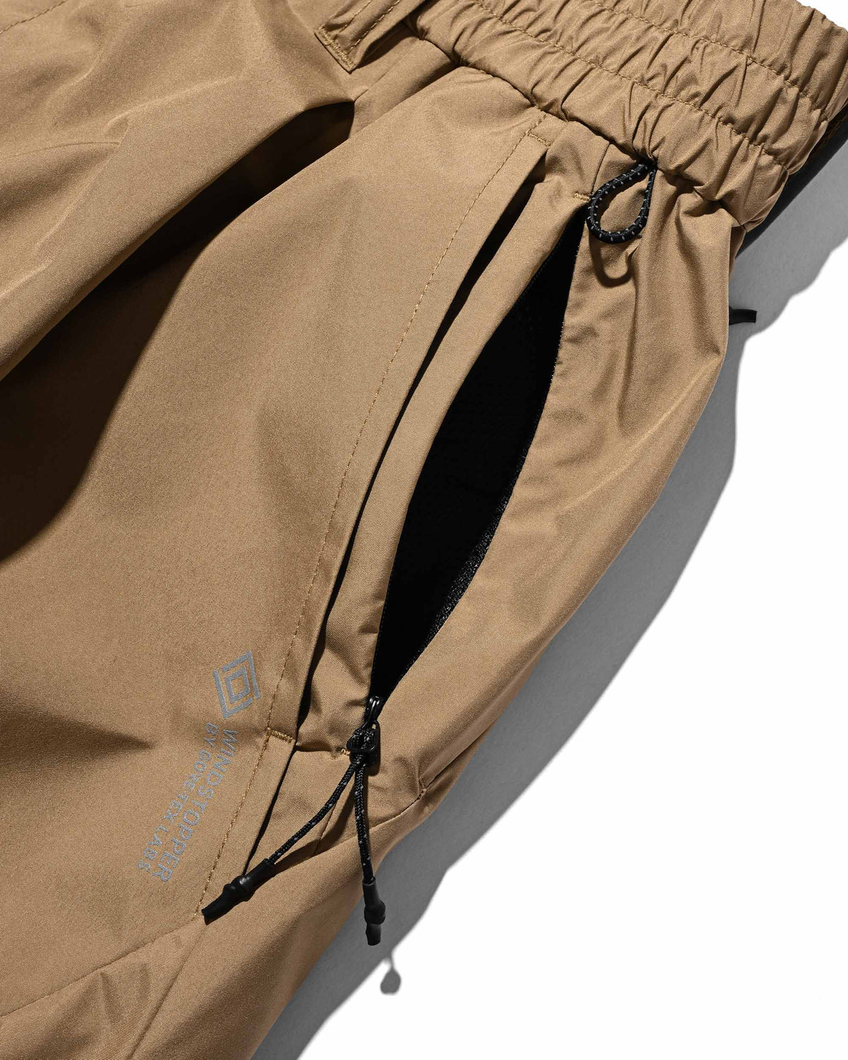 【9.23 WED 20:00- IN STOCK】+phenix WINDSTOPPER® by GORE-TEX LABS TECH MASSIVE TWISTED PANTS (CAMEL BEIGE)