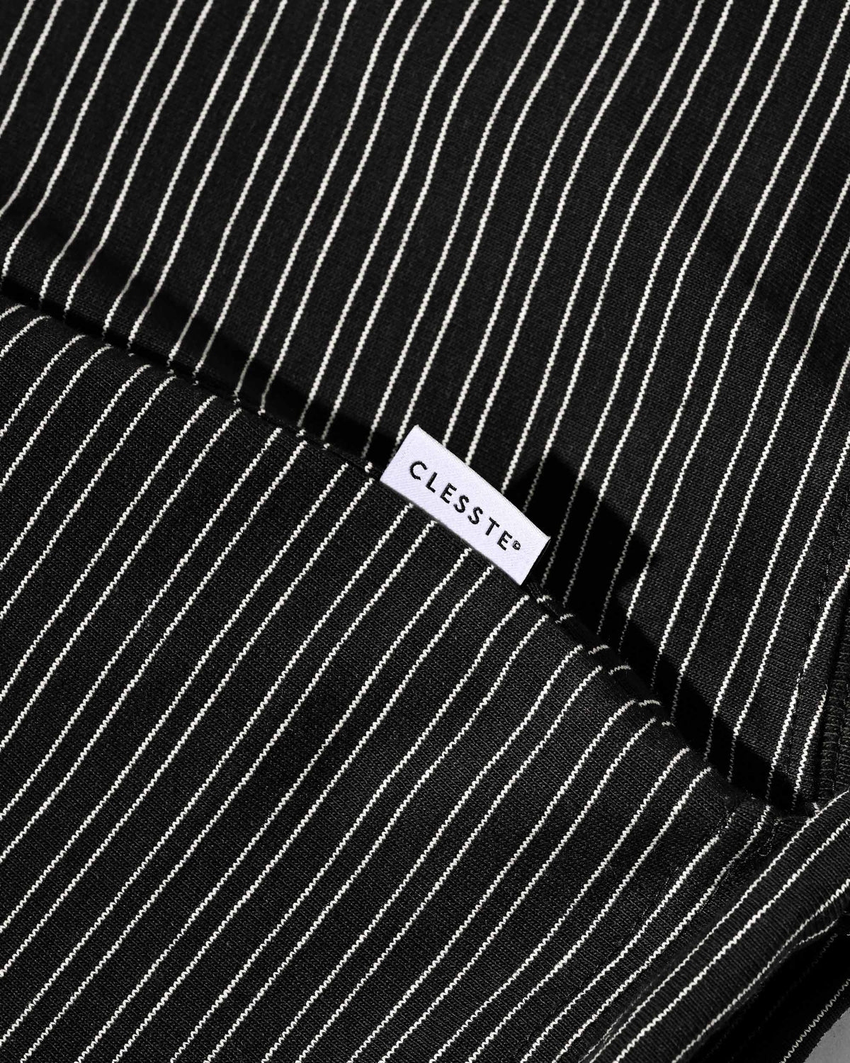 【10.4 SUN 20:00- IN STOCK】【LIMITED】 “YES G♡♡D MARKET" MICRO STRIPED L/S T-SHIRT WITH DRAWSTRINGS (BLACK)