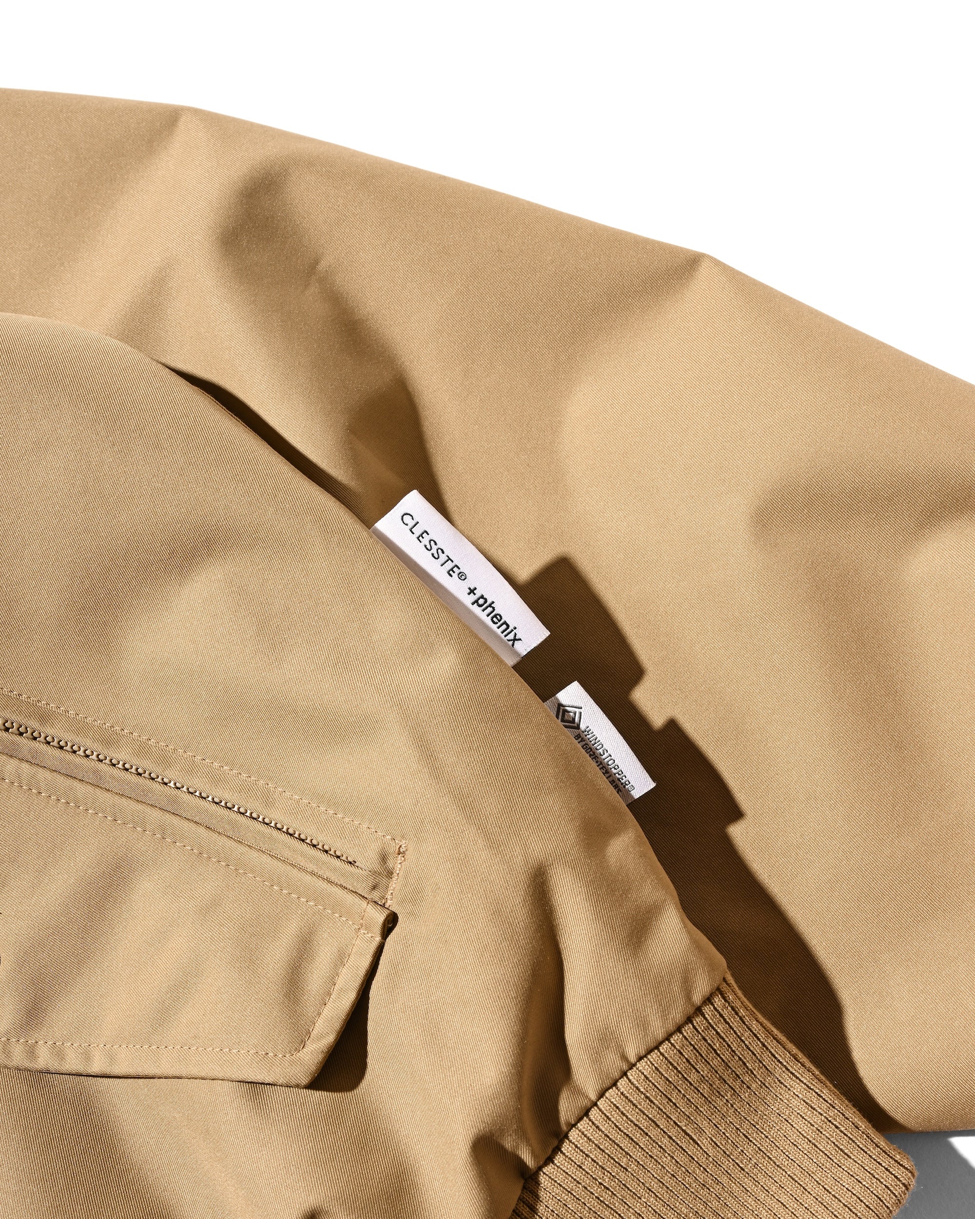 【10.29 WED 20:00- IN STOCK】+phenix WINDSTOPPER® by GORE-TEX LABS TWILL CITY HARRINGTON JACKET (CARAMEL BEIGE)