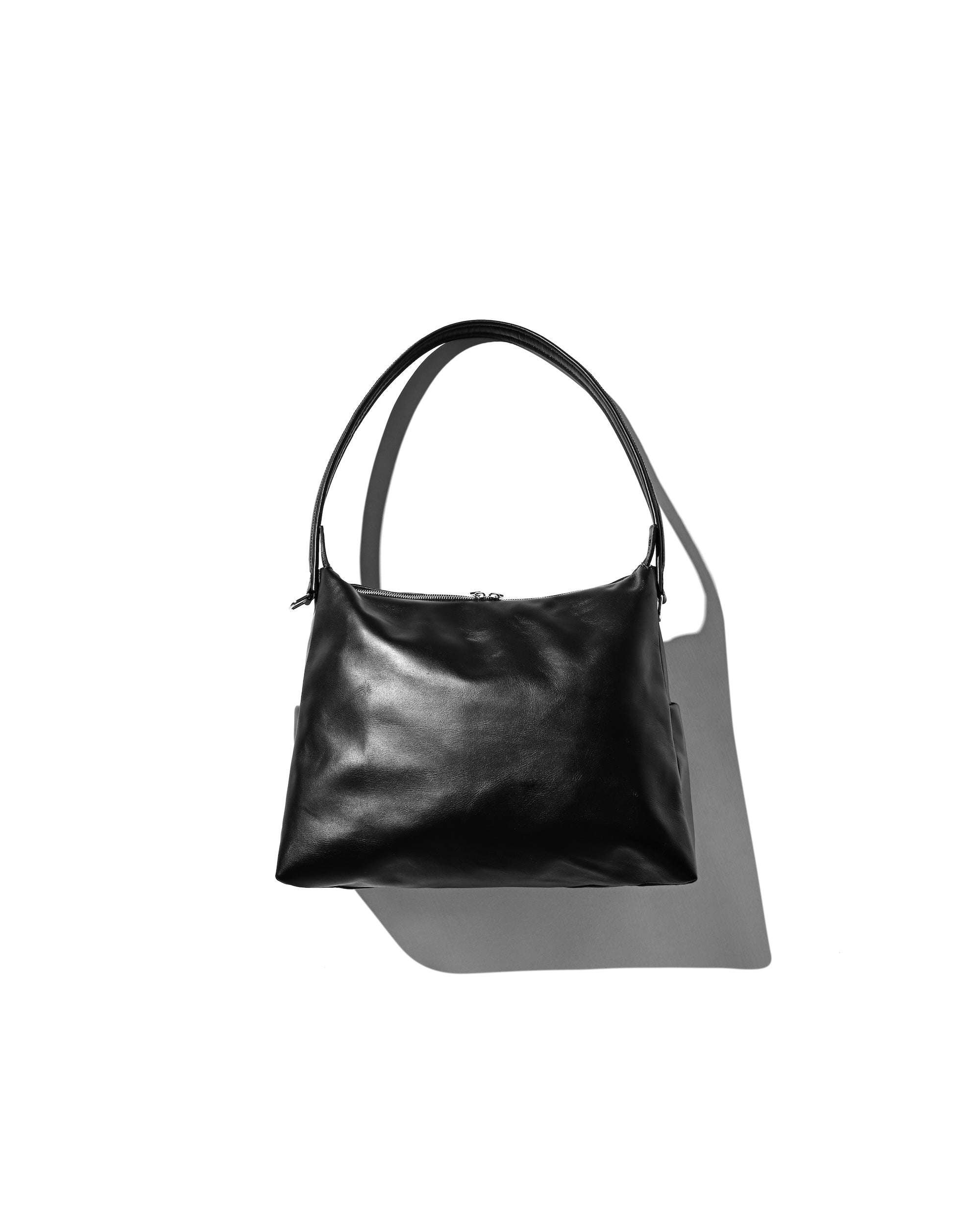 LEATHER NOMAD BAG