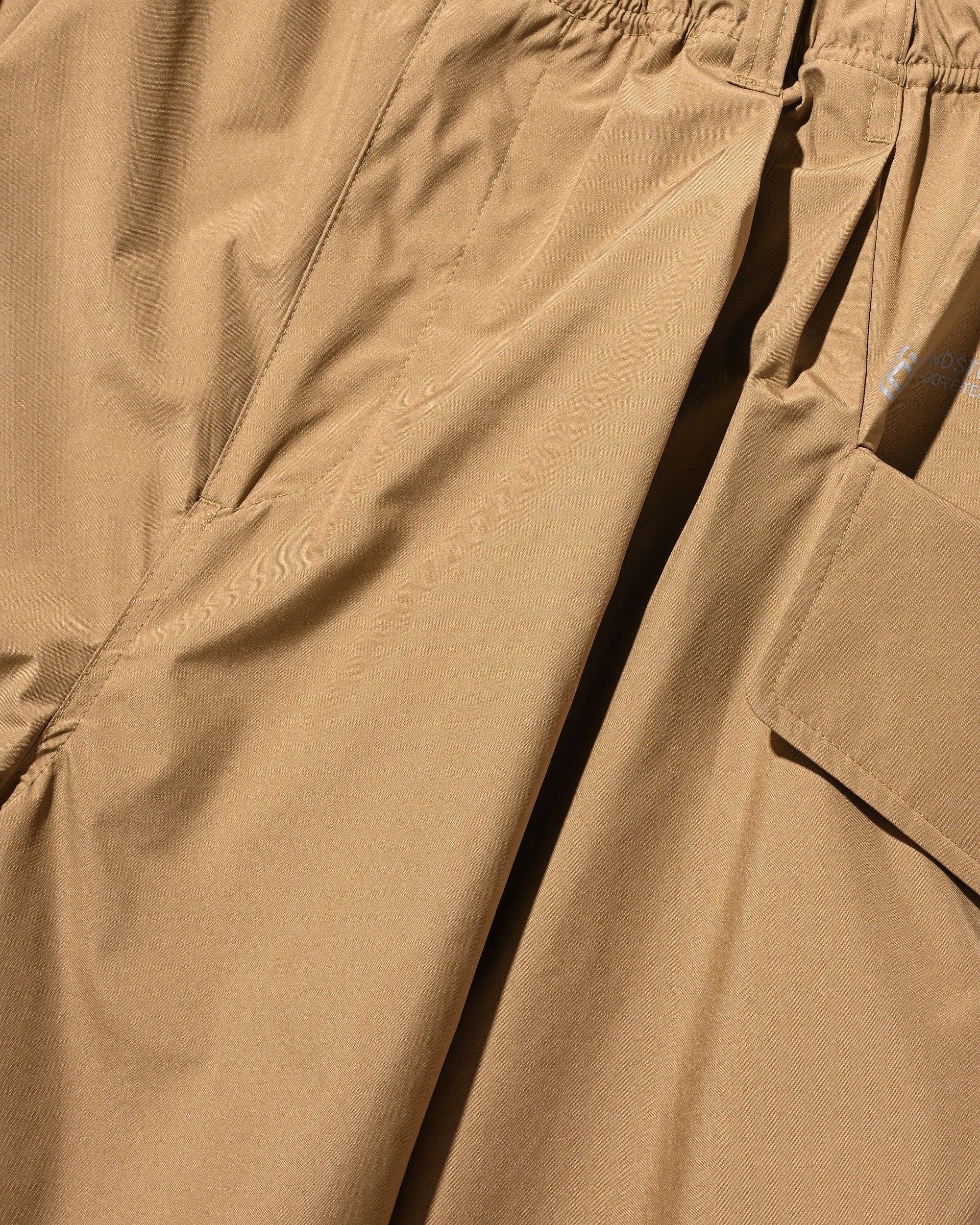 【8.12 WED 20:00- IN STOCK】+phenix WINDSTOPPER® by GORE-TEX LABS CITY FLAP WIDE BALLOON HALF PANTS (CAMEL BEIGE)