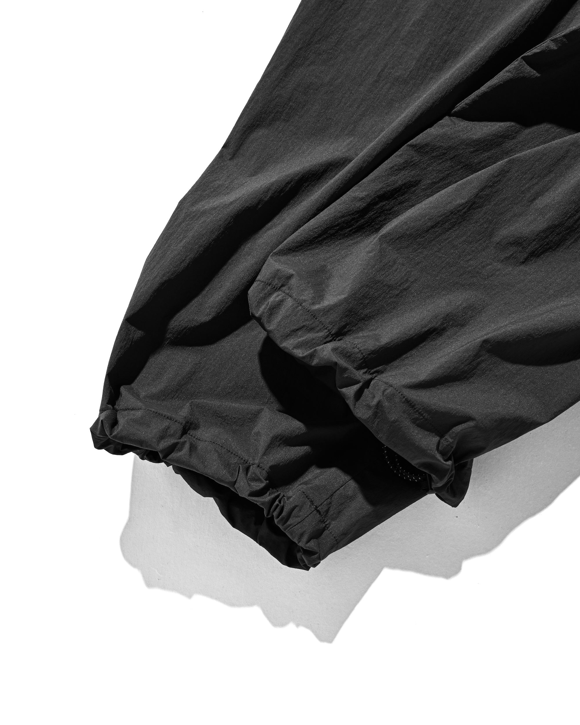 CRISPY NYLON CITY UNIFORM WIDE TAPERED PANTS (CHARCOAL)