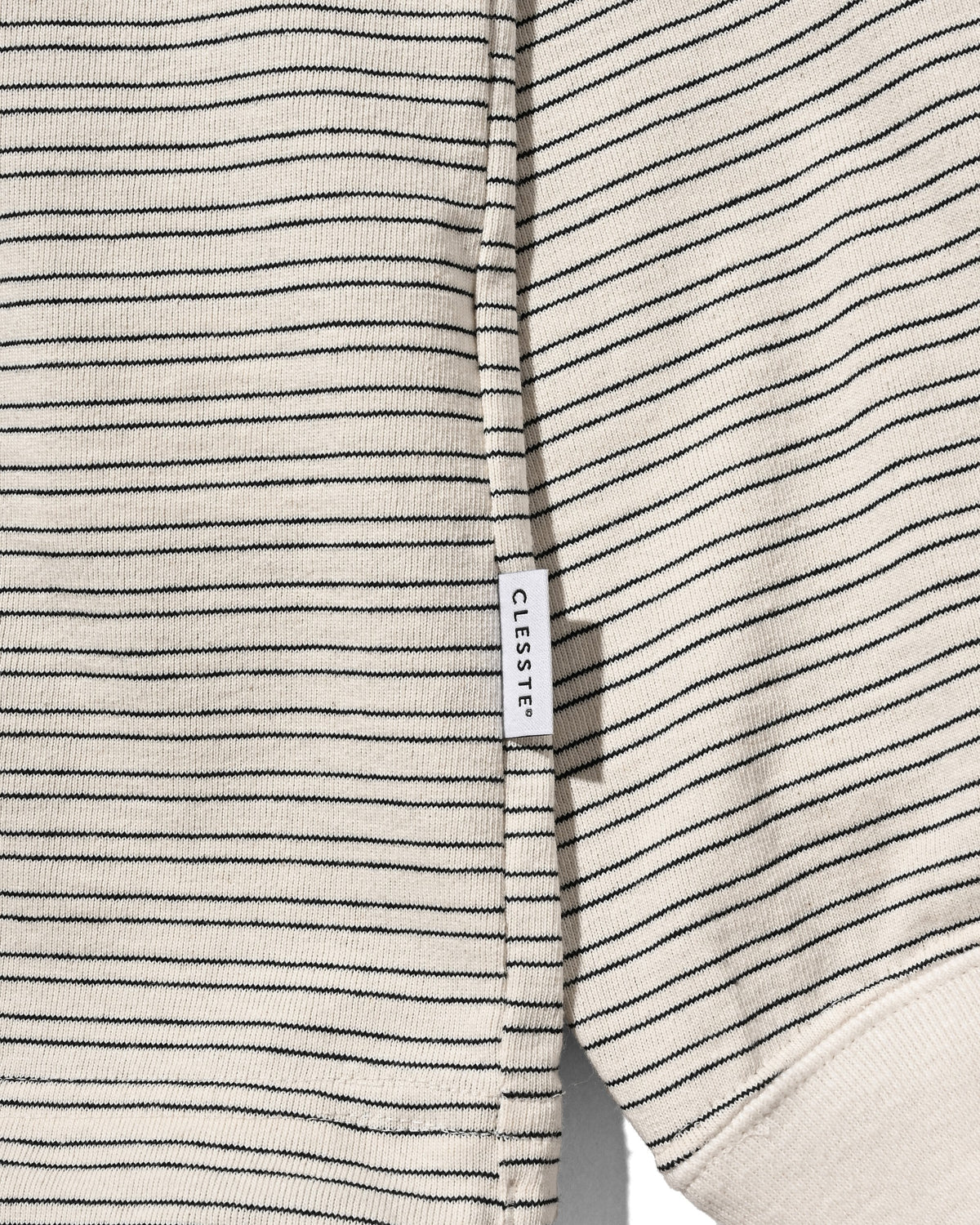 【10.14 WED 20:00- IN STOCK】 MICRO STRIPE HENLEY NECK L/S T-SHIRT WITH DRAWSTRINGS (IVORY)