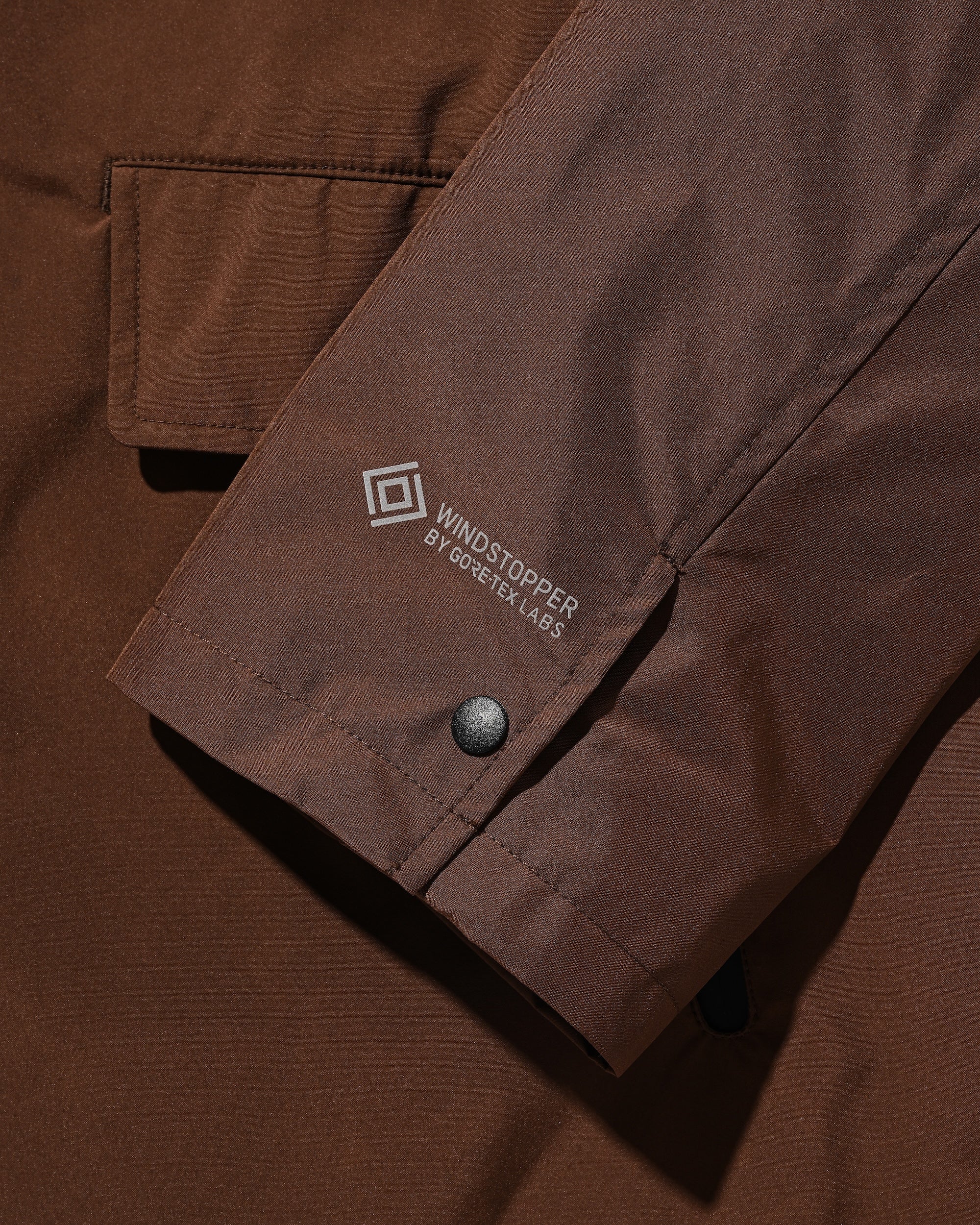 【9.3 WED 20:00- IN STOCK】+phenix WINDSTOPPER® by GORE-TEX LABS ACTIVE CITY STORAGE JACKET (CHOCOLATE BROWN)