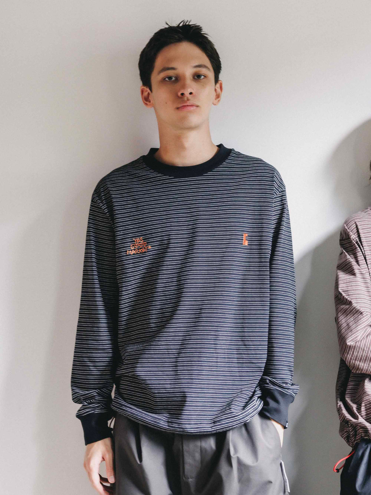 【10.4 SUN 20:00- IN STOCK】【LIMITED】 “YES G♡♡D MARKET" MICRO STRIPED L/S T-SHIRT WITH DRAWSTRINGS (BLACK)