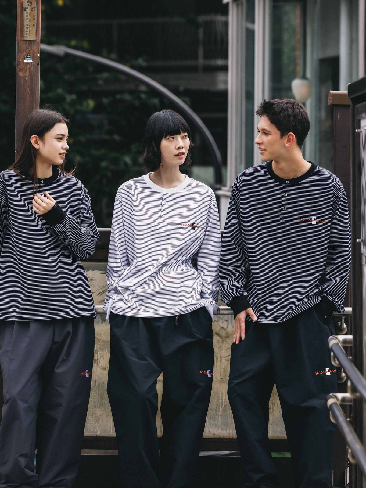【10.4 SUN 20:00- IN STOCK】【LIMITED】 “C×YES GOOD MARKET" STRIPED HENLEY NECK L/S T-SHIRT WITH DRAWSTRINGS (BLACK)