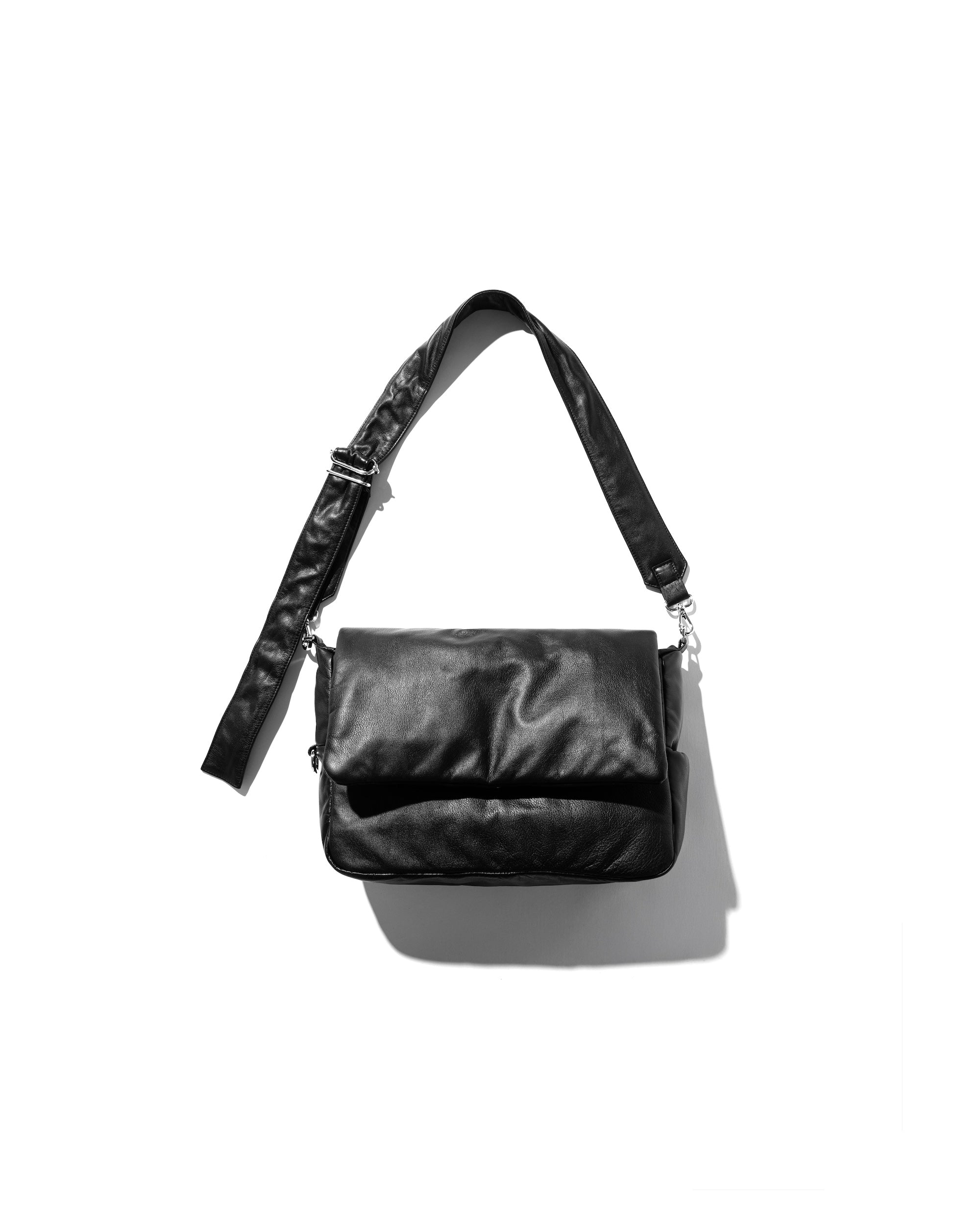 LEATHER PADDED FLAP HOLIDAY BAG