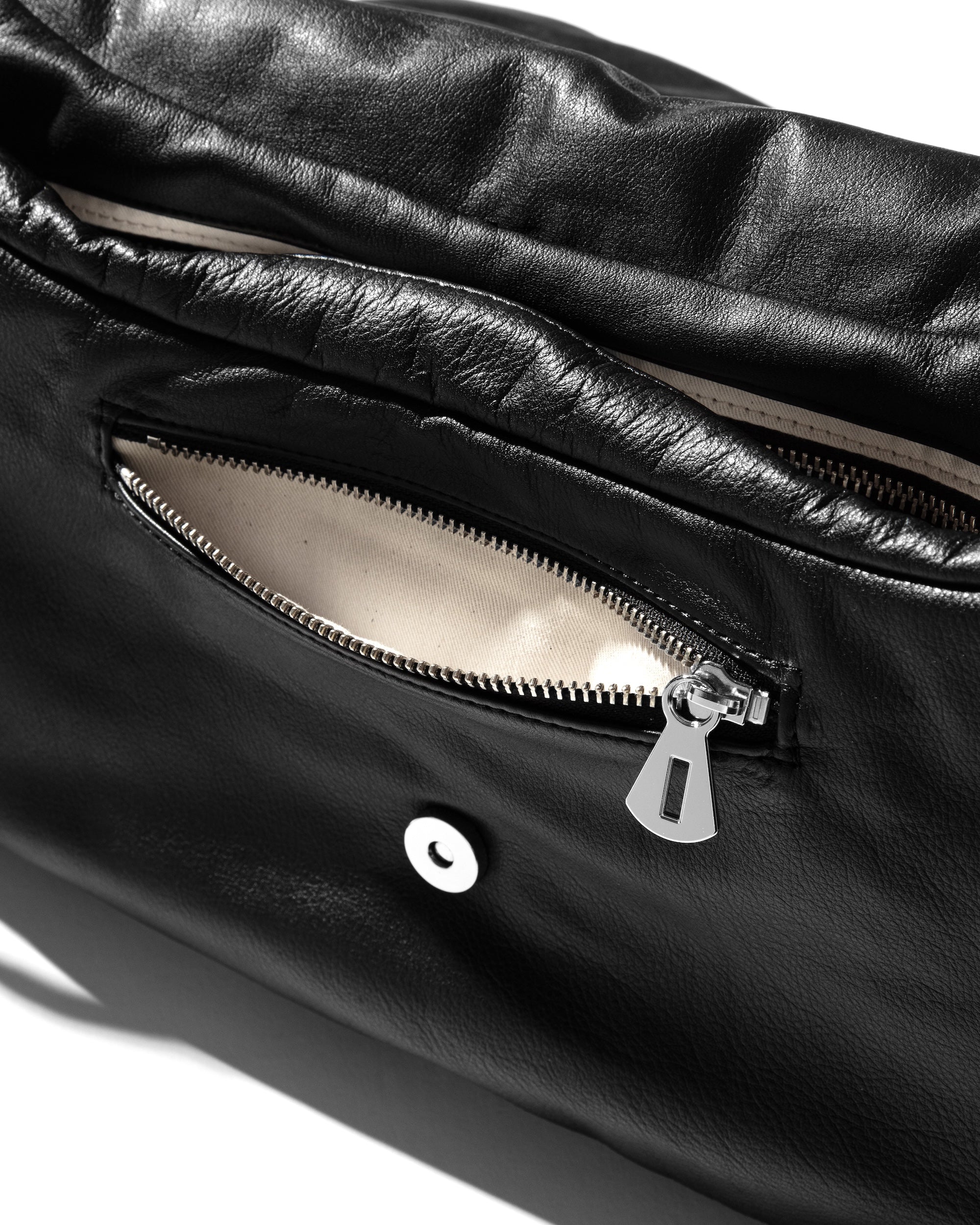 LEATHER PADDED FLAP HOLIDAY BAG