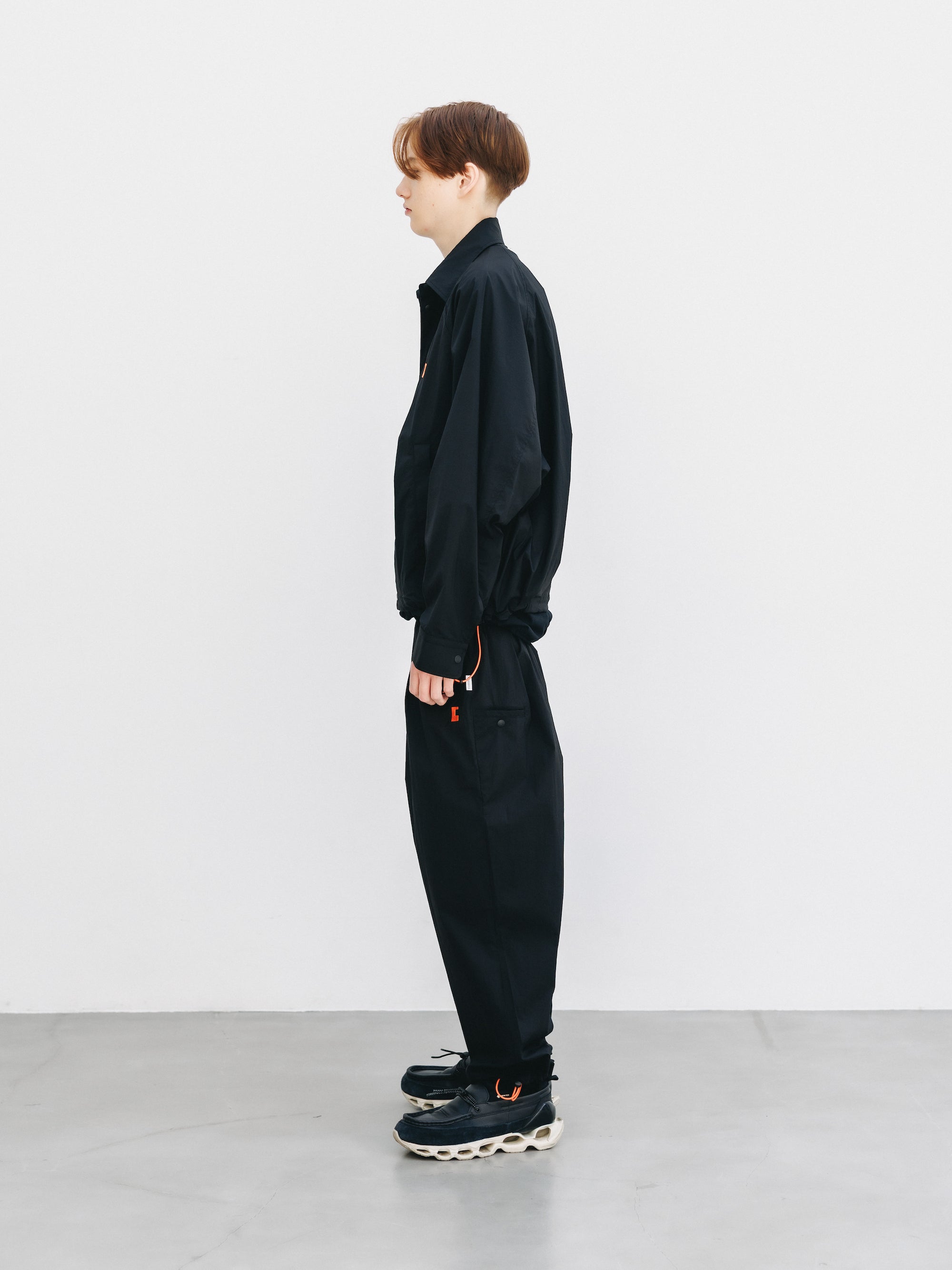 "C” CRISPY NYLON CITY UNIFORM WIDE TAPERED PANTS (BLACK×ORANGE)