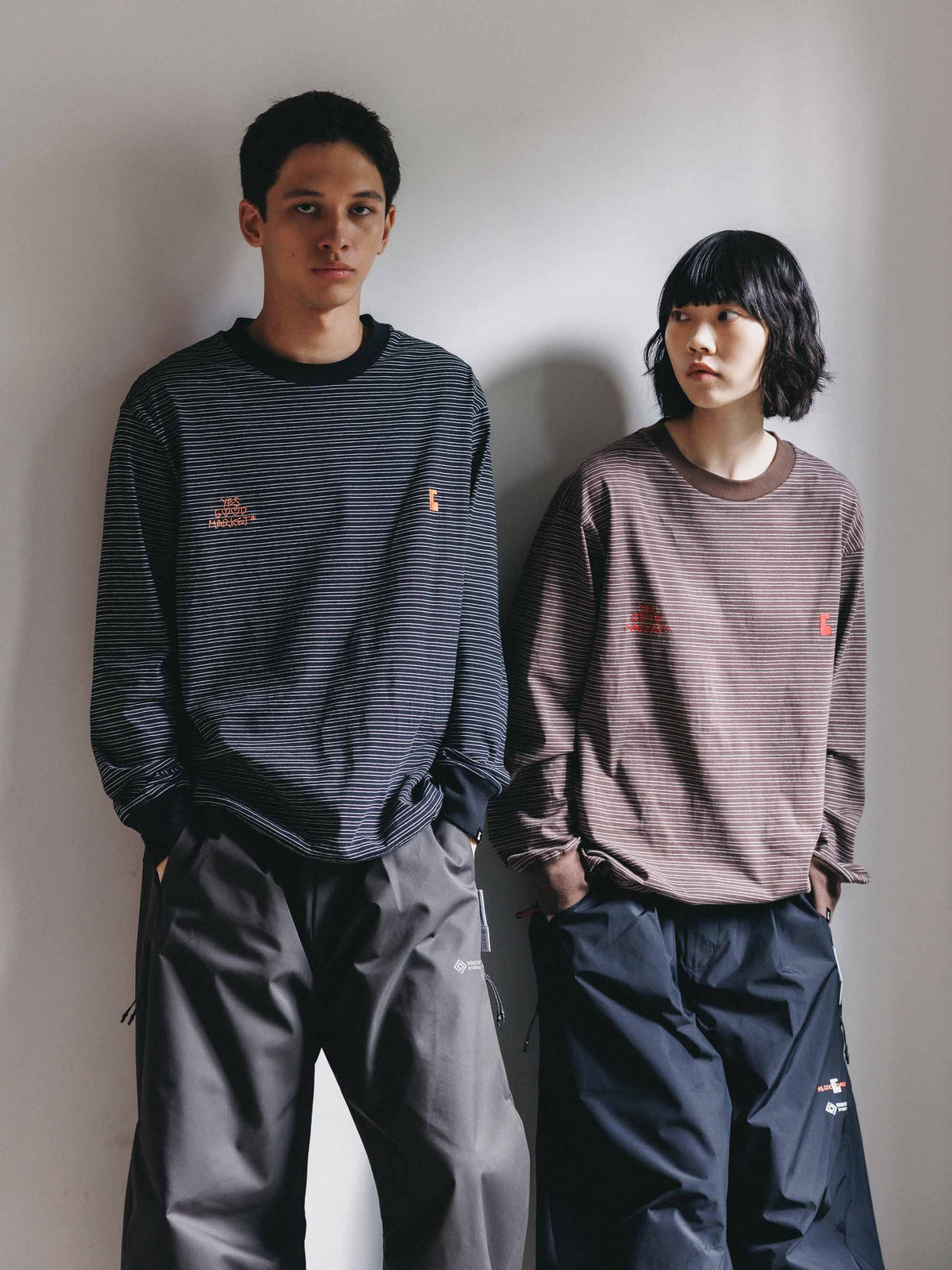 【10.4 SUN 20:00- IN STOCK】【LIMITED】 “YES G♡♡D MARKET" MICRO STRIPED L/S T-SHIRT WITH DRAWSTRINGS (BLACK)