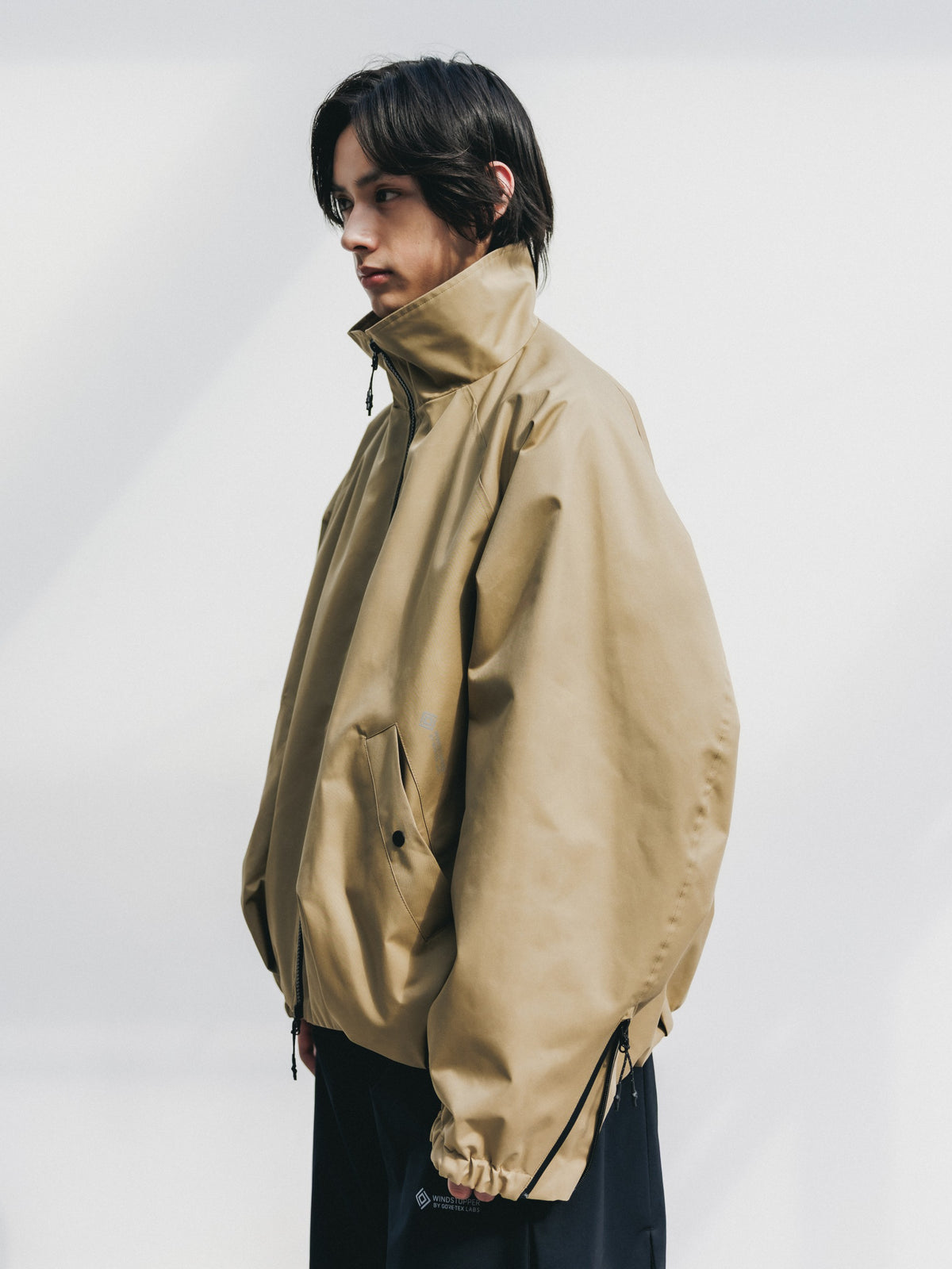 【10.17 SAT 20:00- IN STOCK】 +phenix WINDSTOPPER® by GORE-TEX LABS TWILL CITY STAND BALLOON UTILITY JACKET (CAMEL BEIGE)