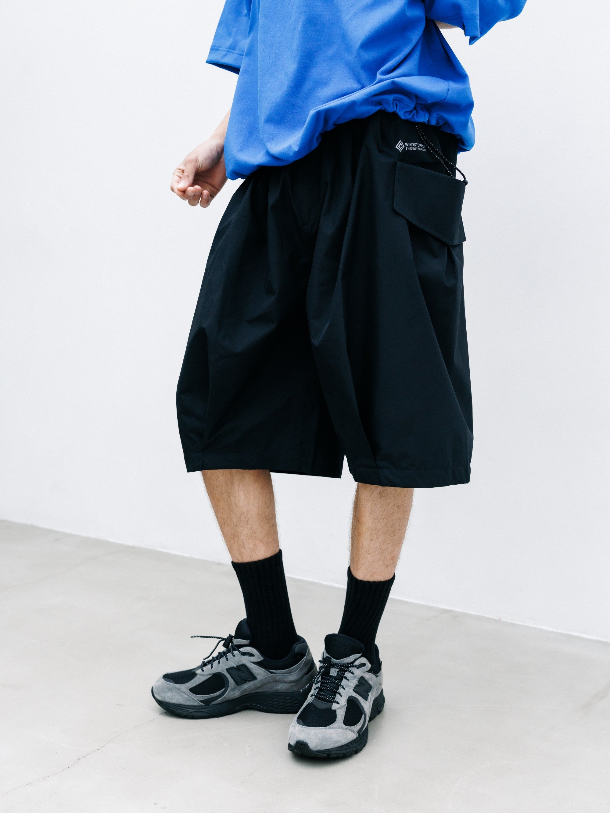 【8.12 WED 20:00- IN STOCK】+phenix WINDSTOPPER® by GORE-TEX LABS CITY FLAP WIDE BALLOON HALF PANTS (BLACK)