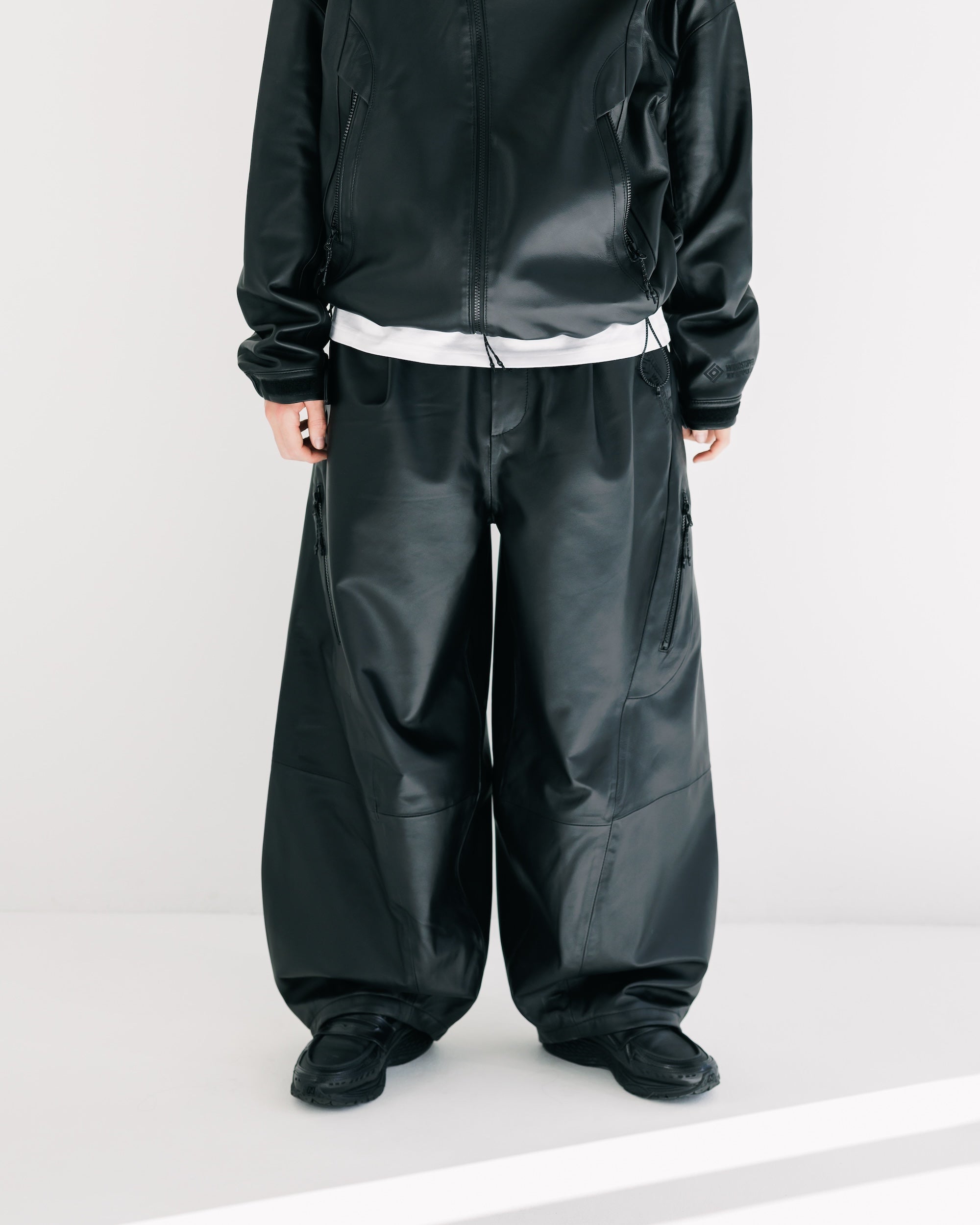 【2.5 WED 20:00- IN STOCK】+phenix WINDSTOPPER® by GORE-TEX LABS LEATHER MASSIVE TWISTED PANTS