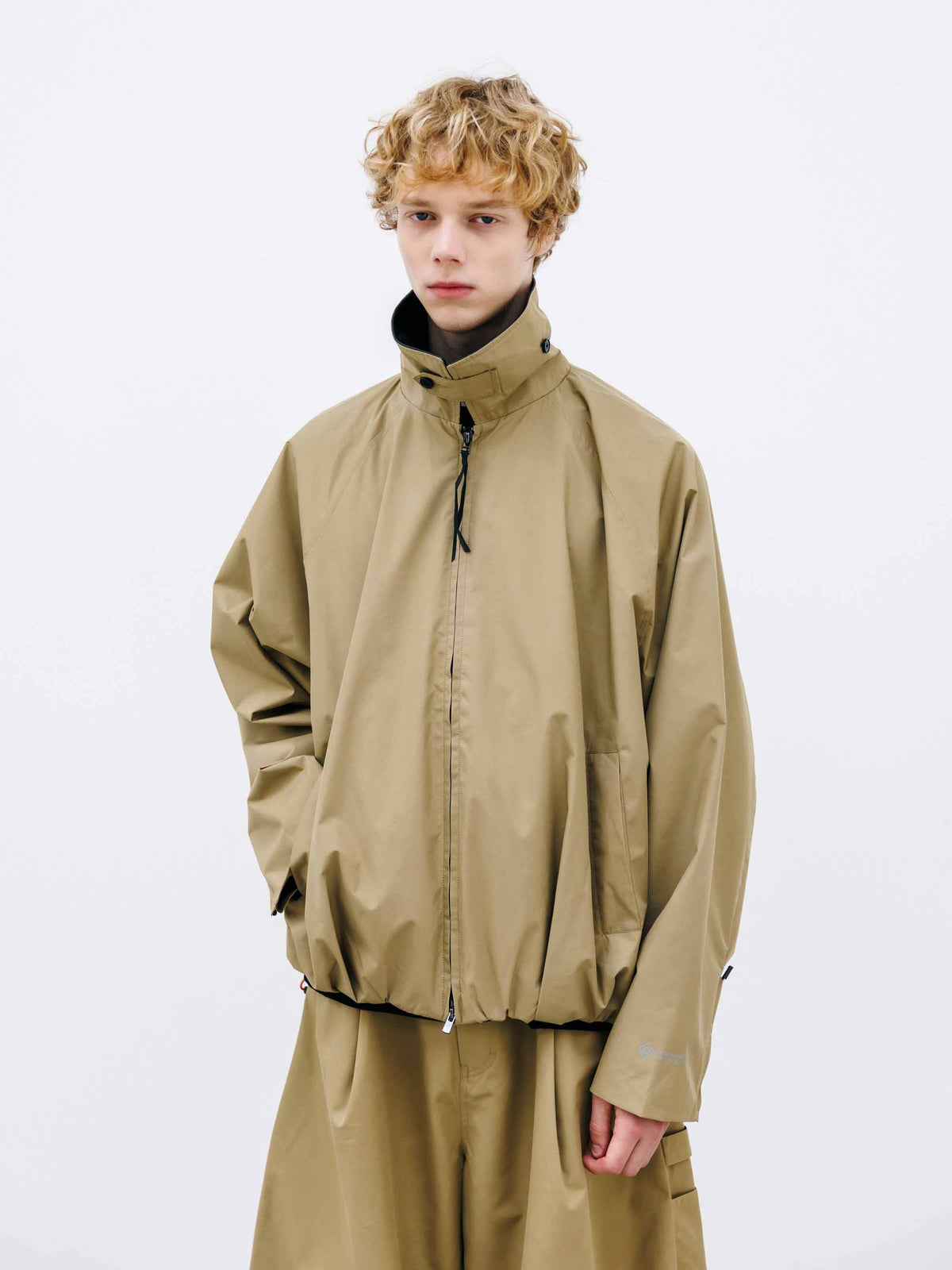 【9.26 SAT 20:00- IN STOCK】+phenix WINDSTOPPER® by GORE-TEX LABS CITY UTILITY BALLOON JACKET (CAMEL BEIGE)