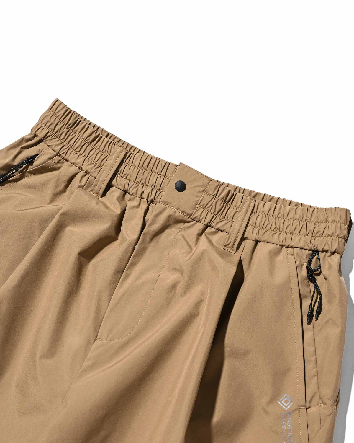 【9.23 WED 20:00- IN STOCK】+phenix WINDSTOPPER® by GORE-TEX LABS TECH MASSIVE TWISTED PANTS (CAMEL BEIGE)