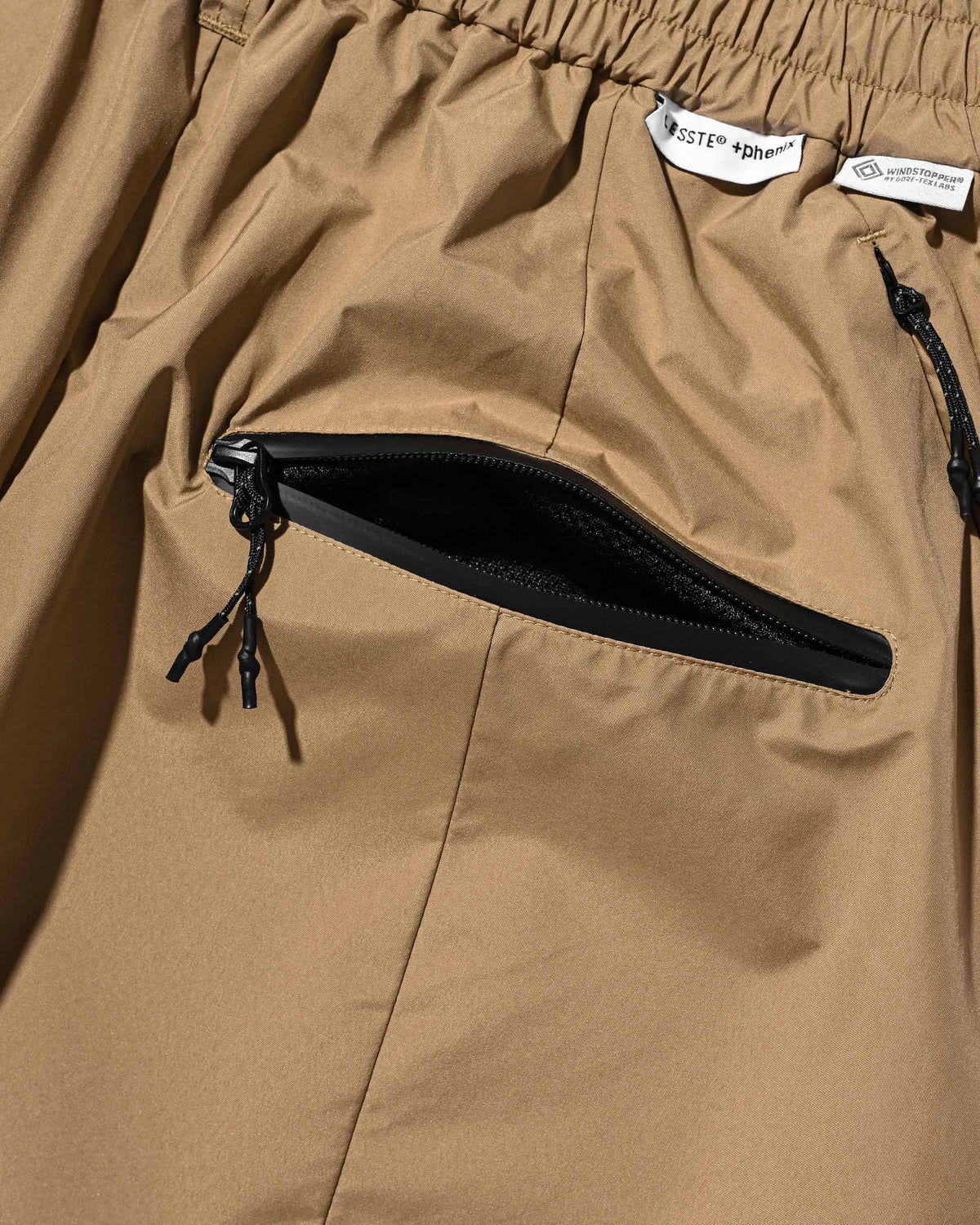 【9.23 WED 20:00- IN STOCK】+phenix WINDSTOPPER® by GORE-TEX LABS TECH MASSIVE TWISTED PANTS (CAMEL BEIGE)