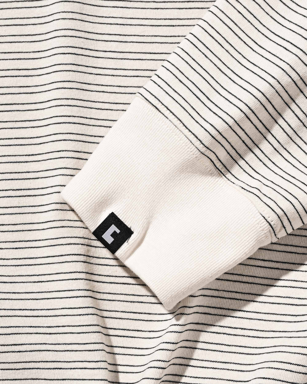 【10.4 SUN 20:00- IN STOCK】【LIMITED】 “YES G♡♡D MARKET" MICRO STRIPED L/S T-SHIRT WITH DRAWSTRINGS (IVORY)