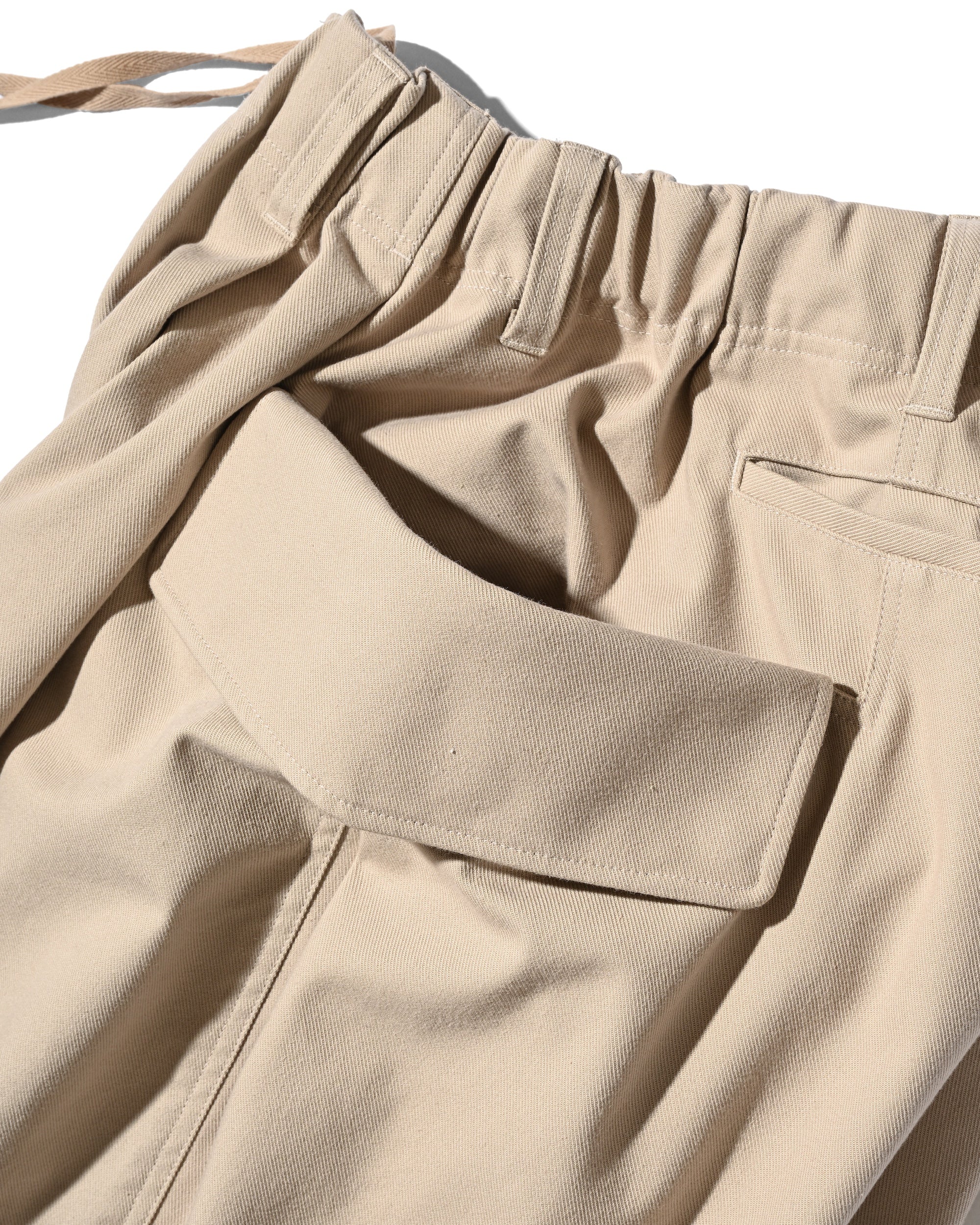 SIDE FLAP CURVE PANTS (BEIGE)