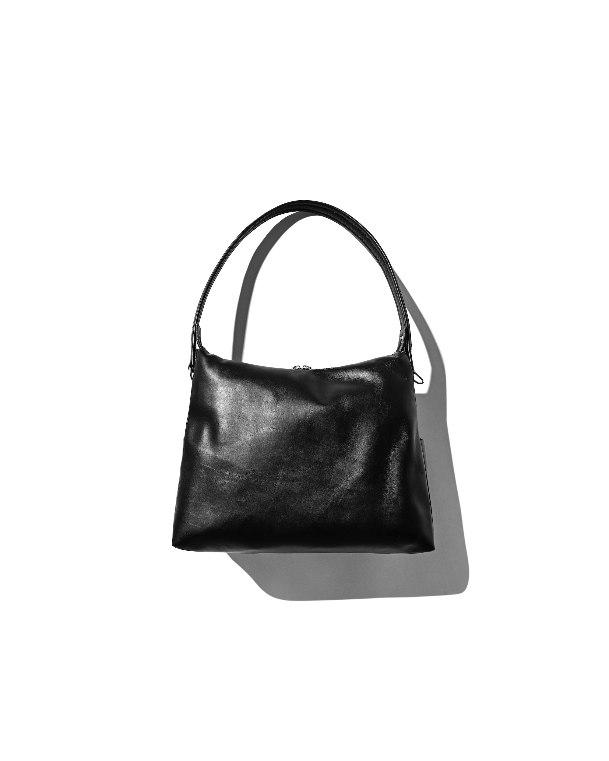 LEATHER NOMAD BAG