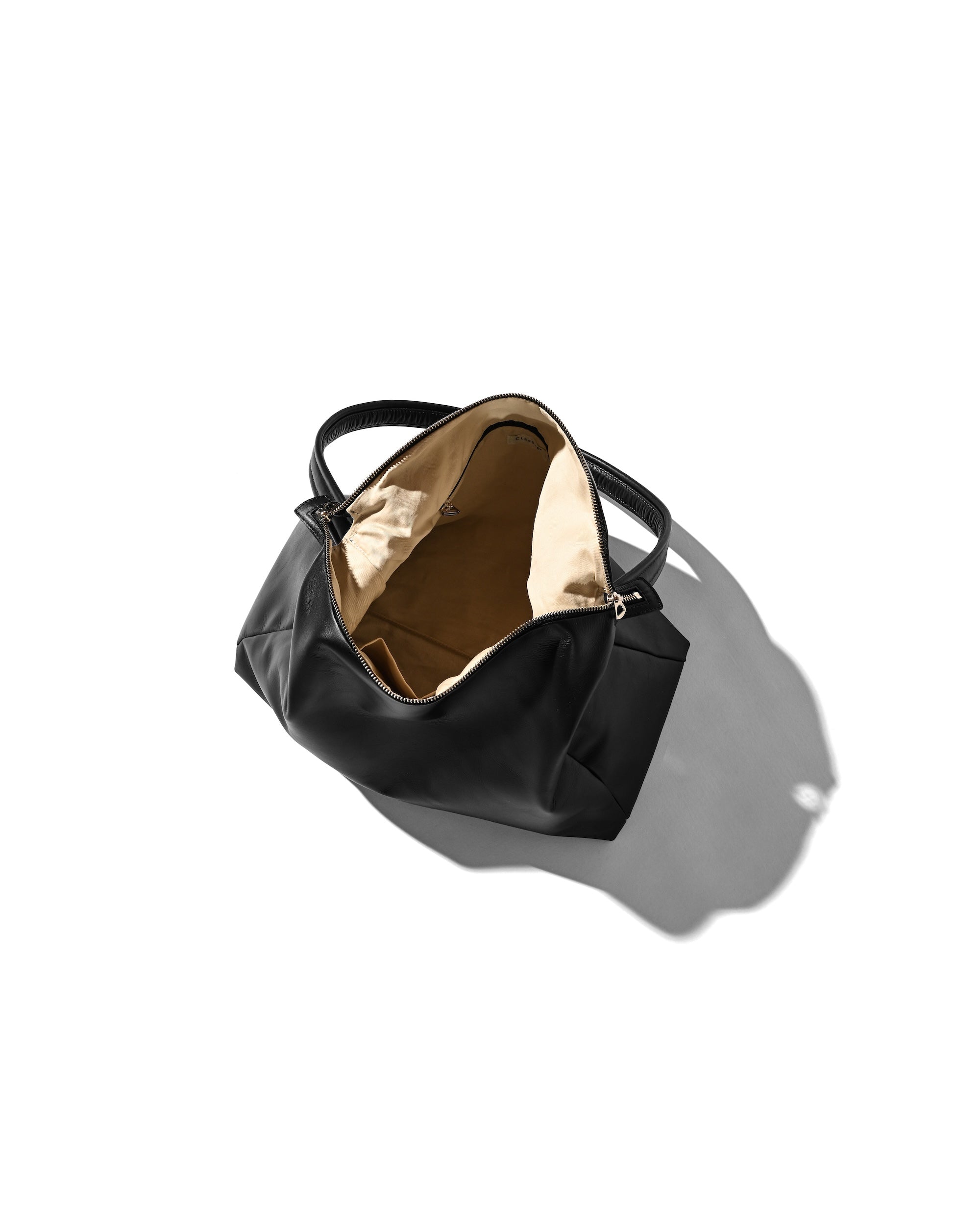 LEATHER NOMAD BAG
