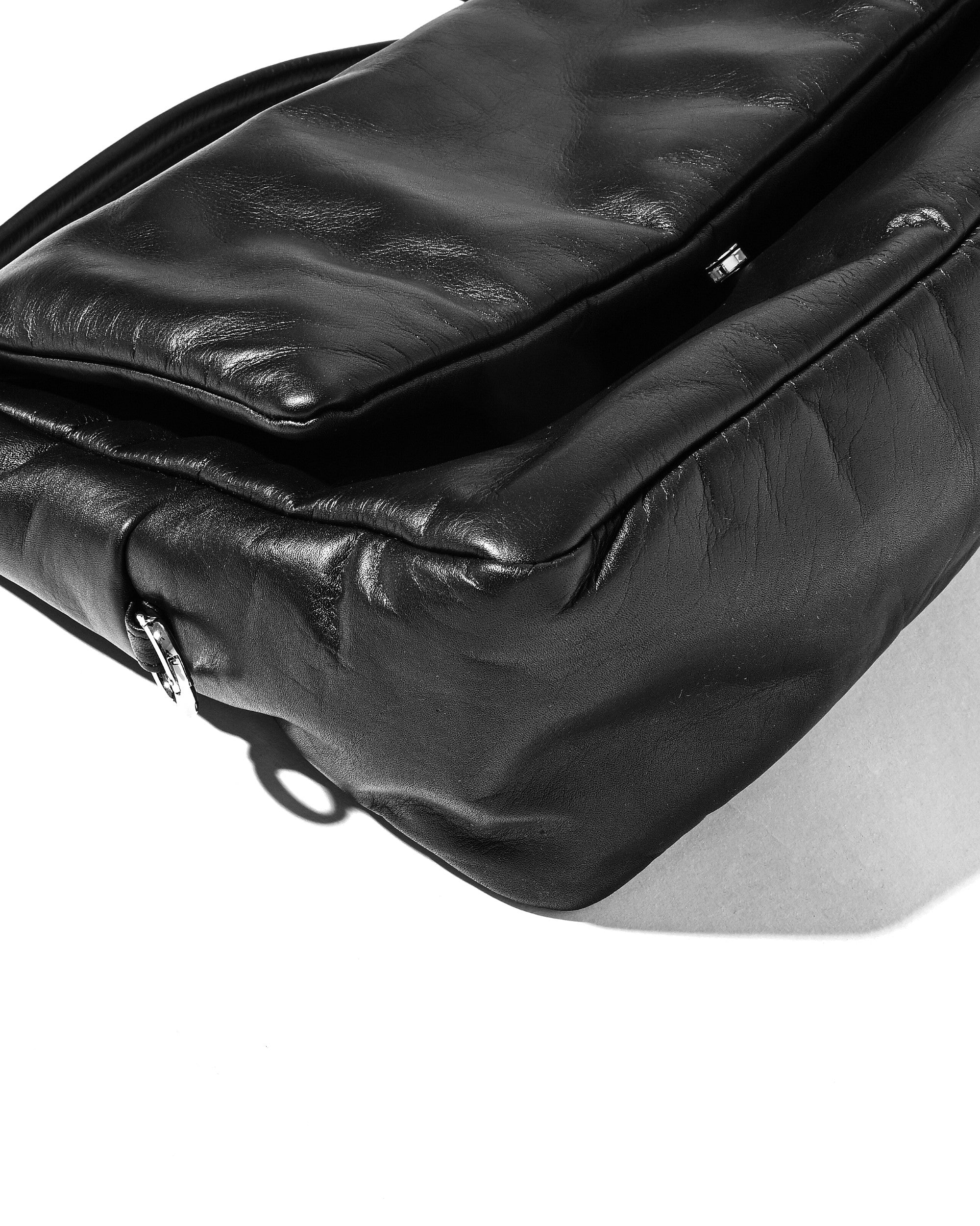 LEATHER PADDED FLAP HOLIDAY BAG