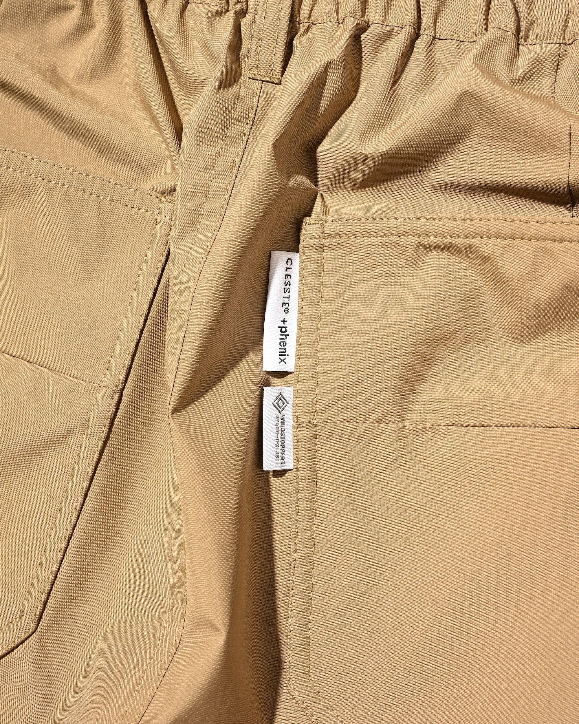 【7.8 WED 20:00- IN STOCK】+PHENIX WINDSTOPPER® BY GORE-TEX LABS TWILL CITY MASSIVE UTILITY HALF PANTS (CAMEL BEIGE)