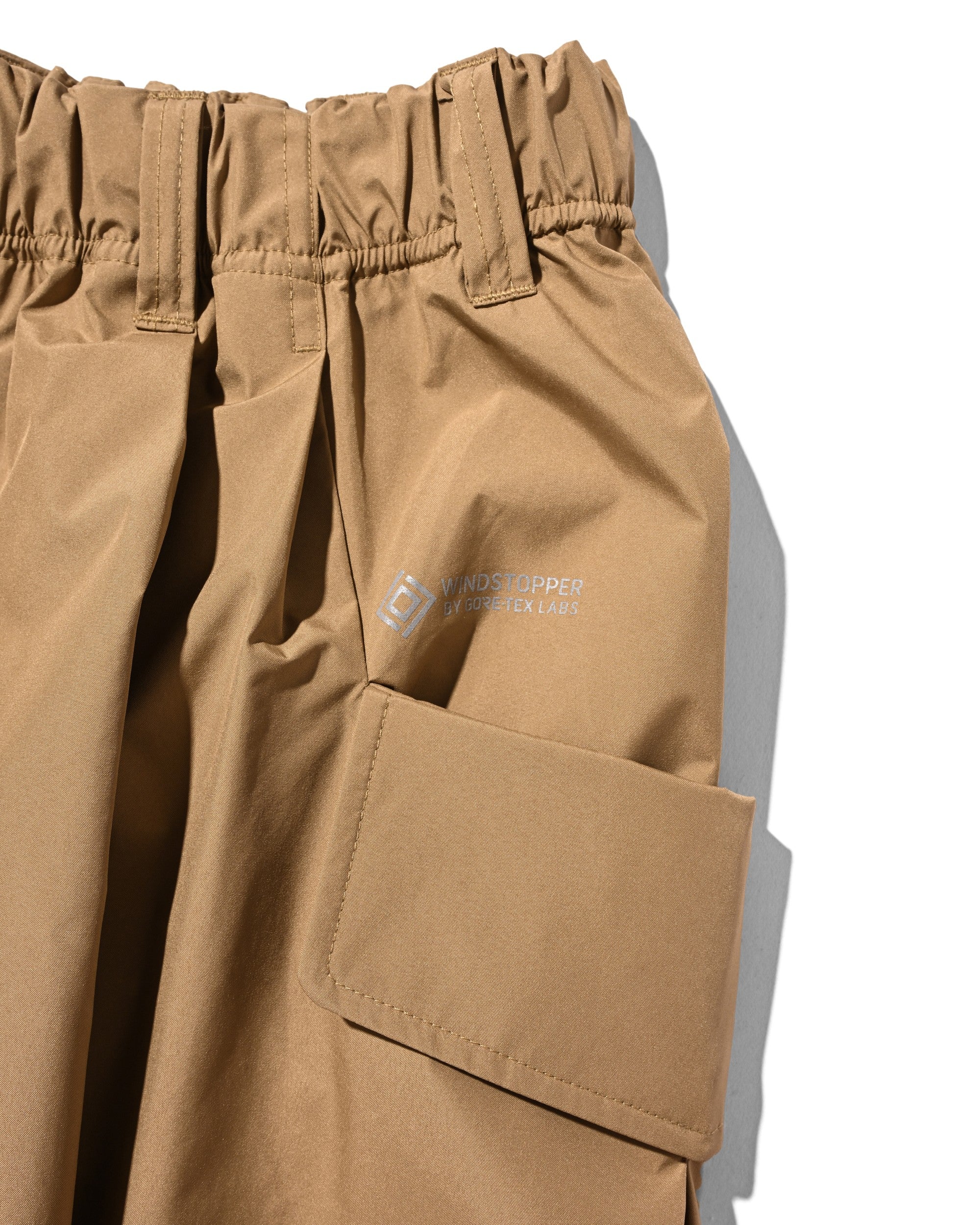 【8.12 WED 20:00- IN STOCK】+phenix WINDSTOPPER® by GORE-TEX LABS CITY FLAP WIDE BALLOON HALF PANTS (CAMEL BEIGE)