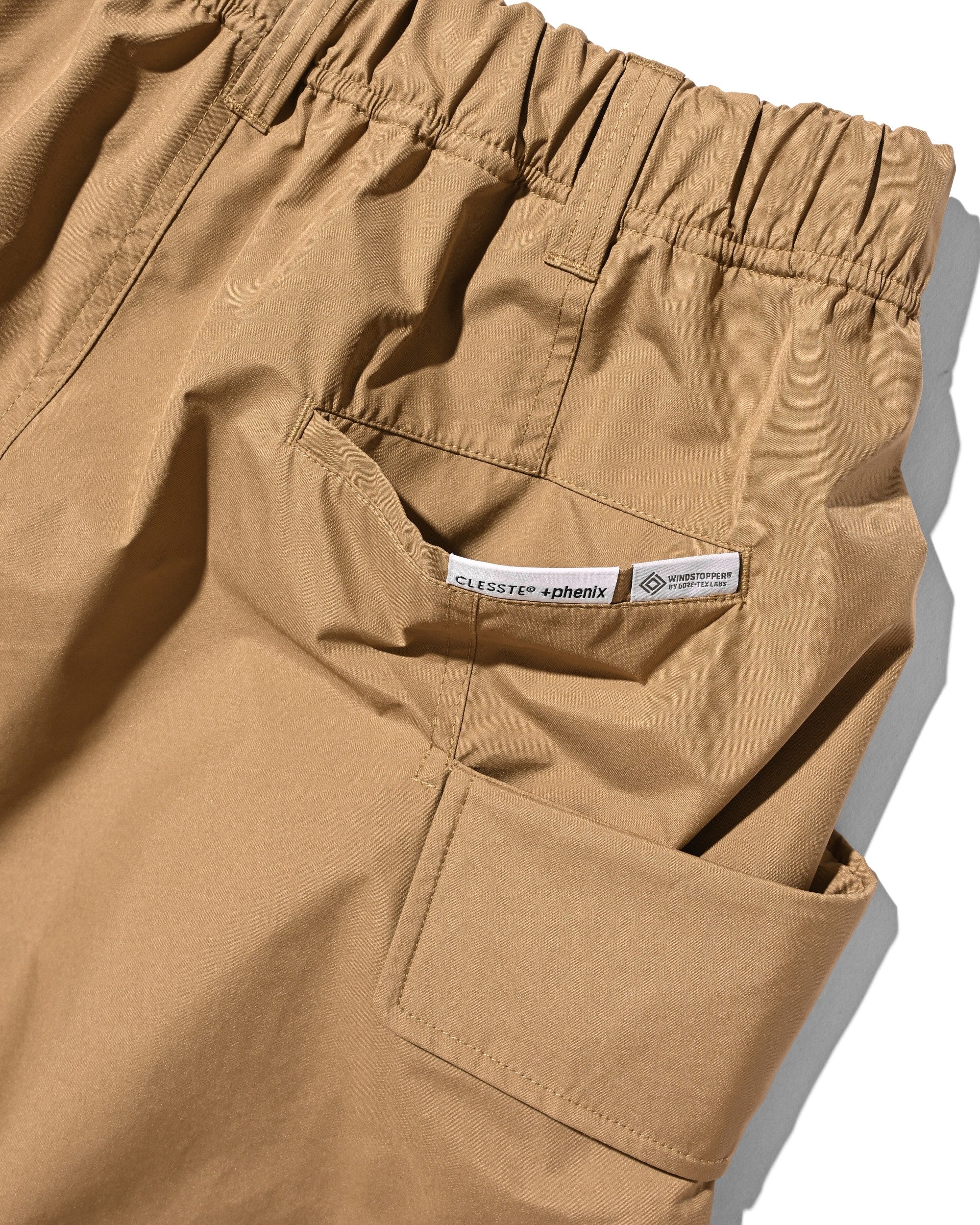 【8.12 WED 20:00- IN STOCK】+phenix WINDSTOPPER® by GORE-TEX LABS CITY FLAP WIDE BALLOON HALF PANTS (CAMEL BEIGE)