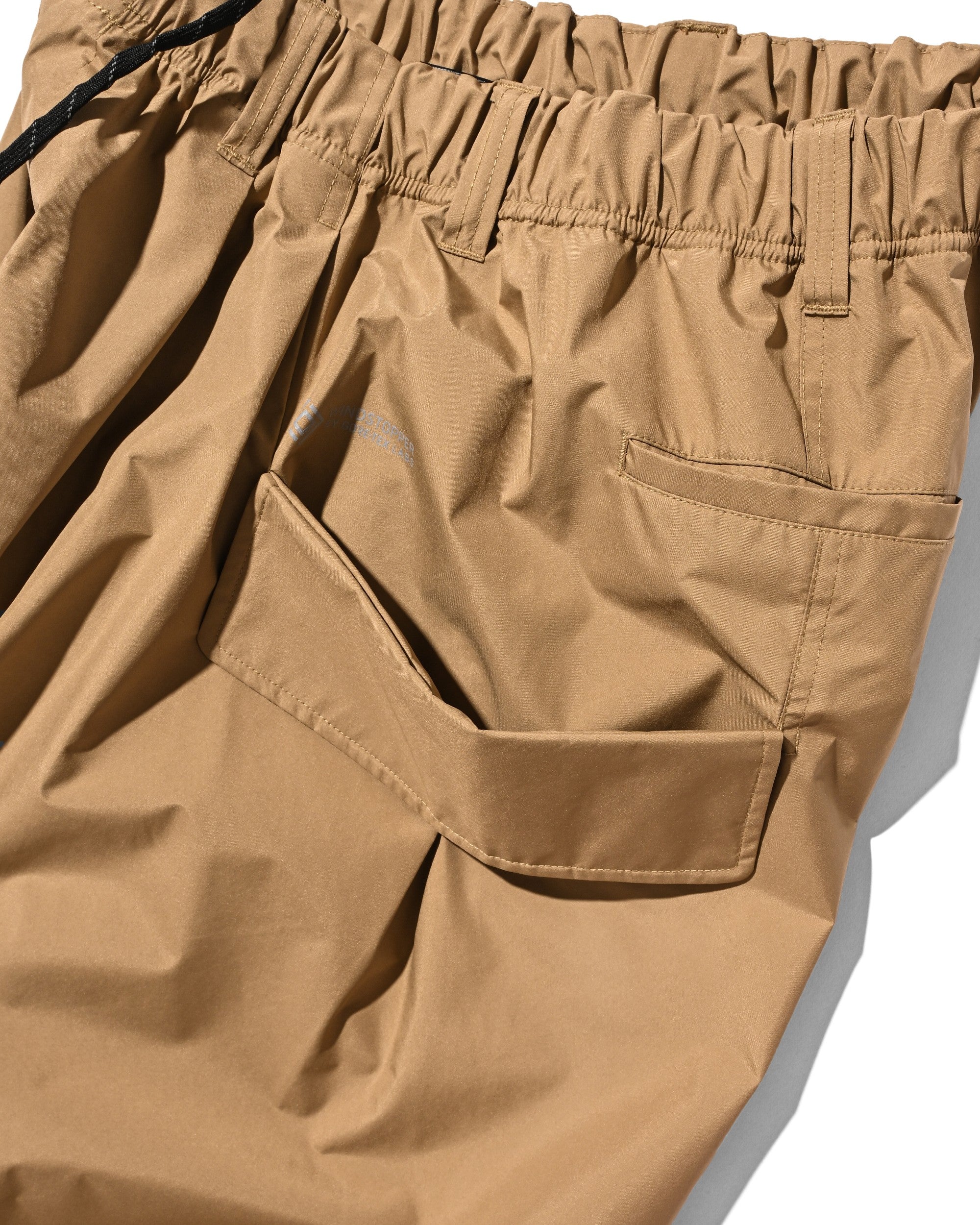 【8.12 WED 20:00- IN STOCK】+phenix WINDSTOPPER® by GORE-TEX LABS CITY FLAP WIDE BALLOON HALF PANTS (CAMEL BEIGE)